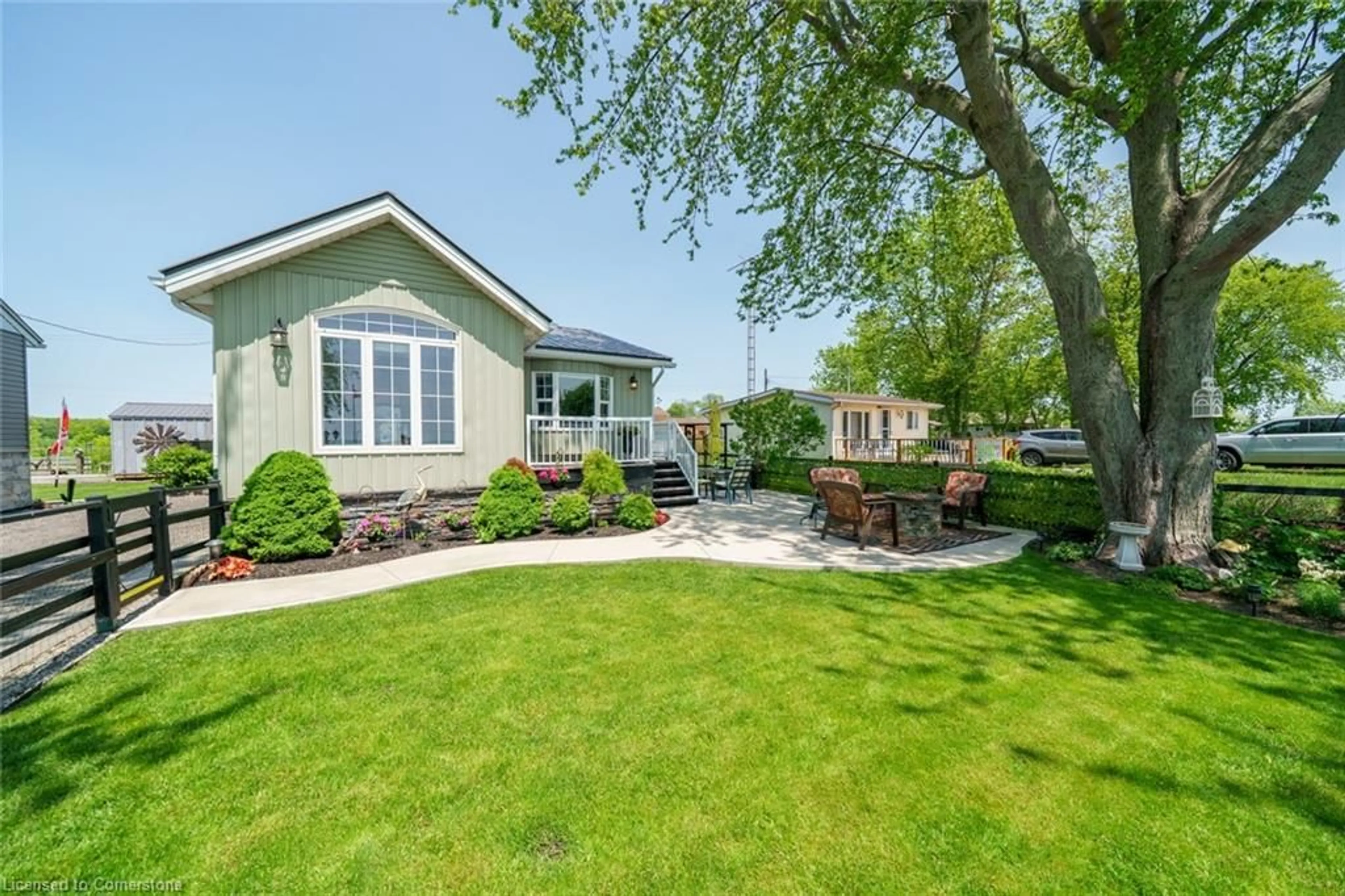 Home with vinyl exterior material, street for 1235 Lakeshore Rd, Dunnville Ontario N0A 1P0