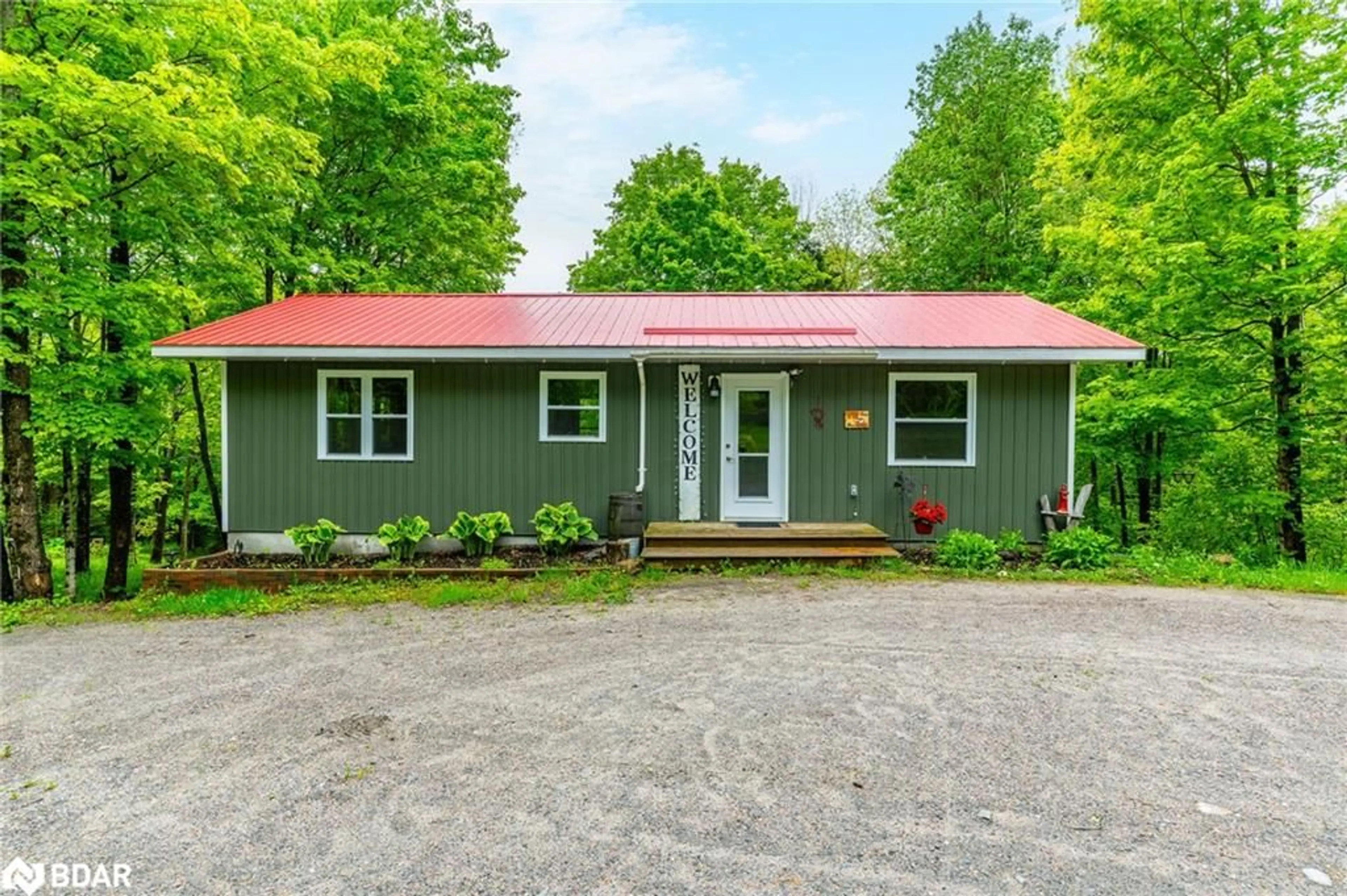 Home with vinyl exterior material, street for 1664 Minnicock Lake Rd, Haliburton Ontario K0M 1S0