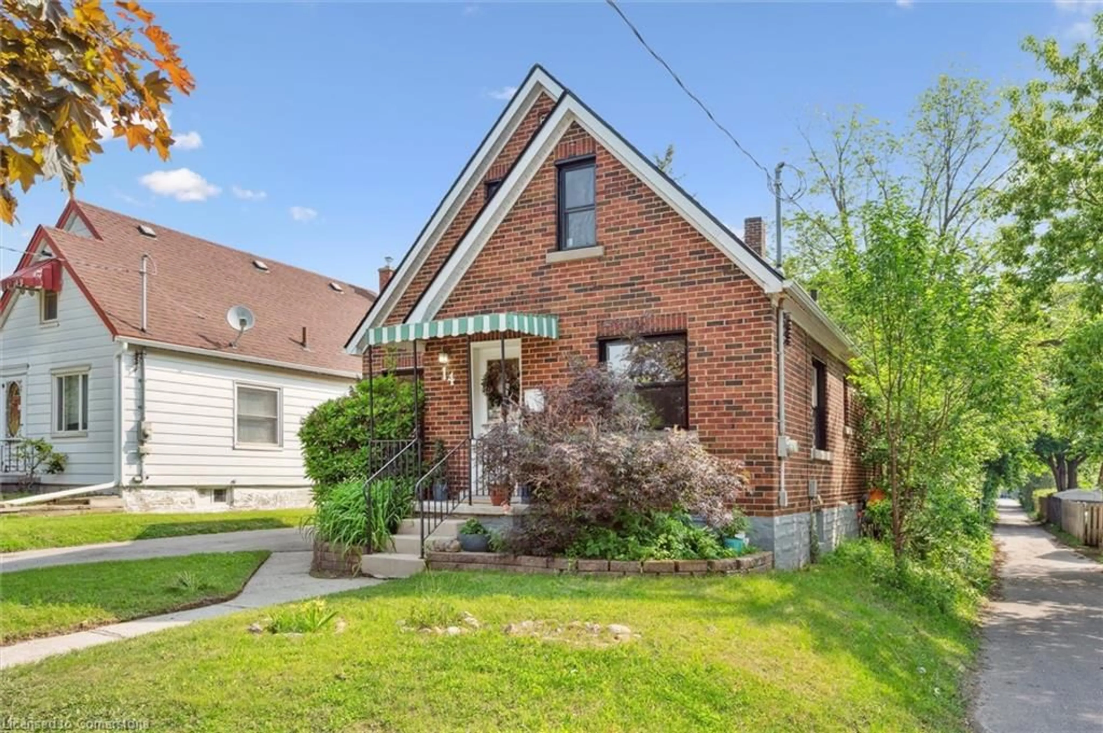 Home with brick exterior material, street for 14 Edwin St, Kitchener Ontario N2H 4N8