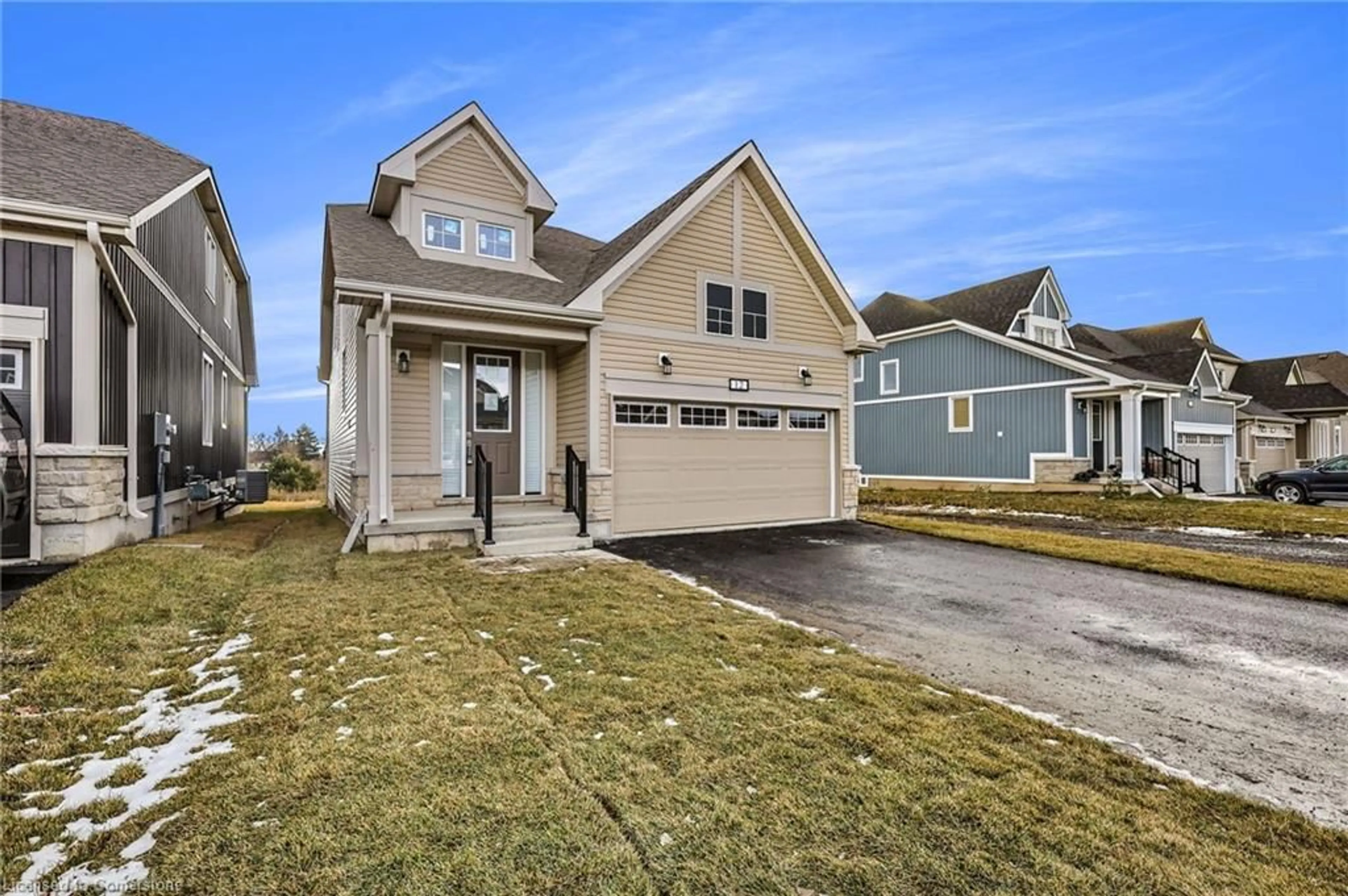 Home with vinyl exterior material, street for 12 Oakmont Dr, Loyalist Township Ontario K0H 1G0