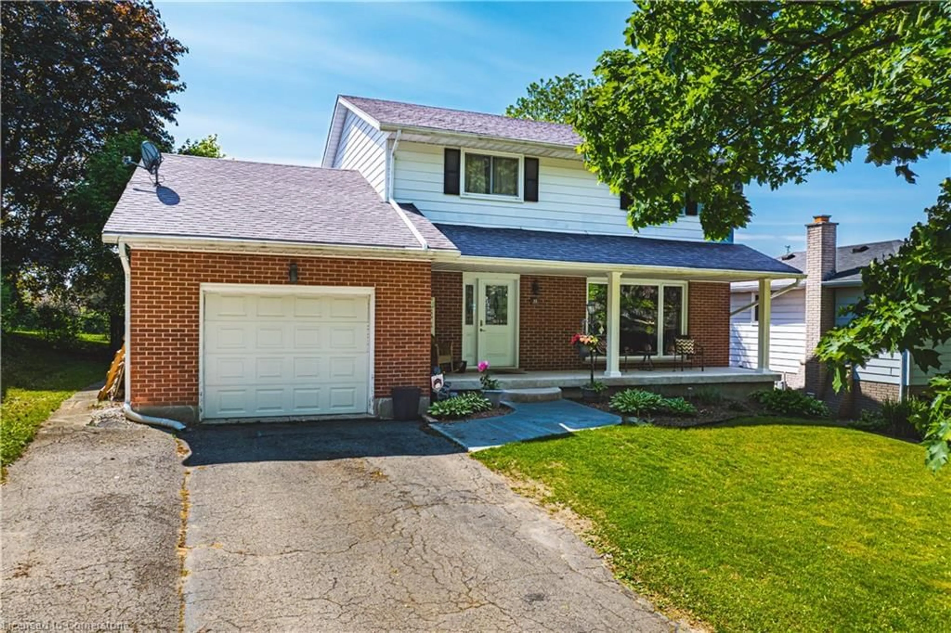 Home with brick exterior material, street for 22 Carriage Rd, Simcoe Ontario N3Y 4X2