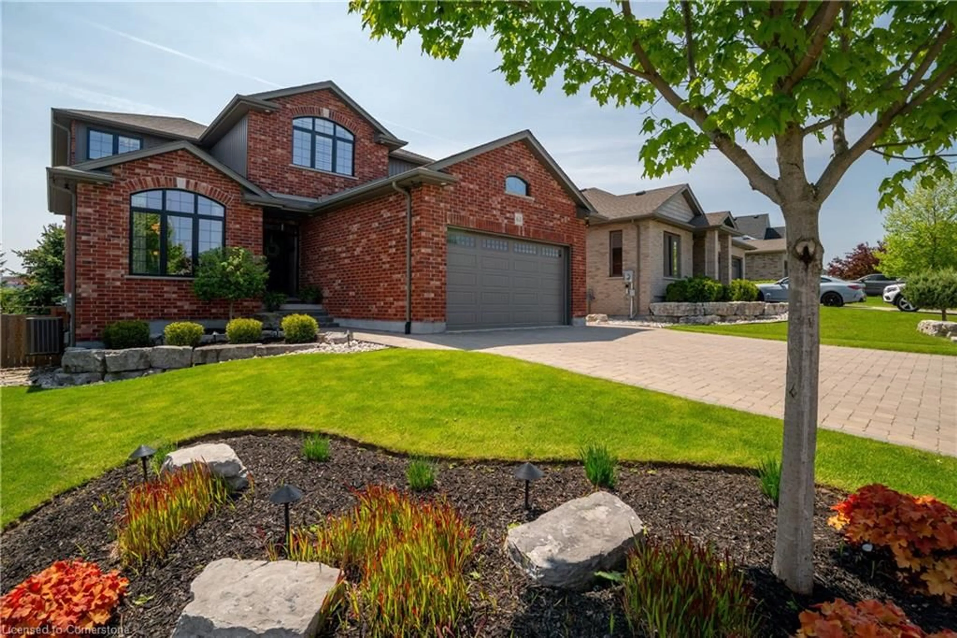 Home with brick exterior material, street for 61 Law Drive Dr, Guelph Ontario N1E 7J6
