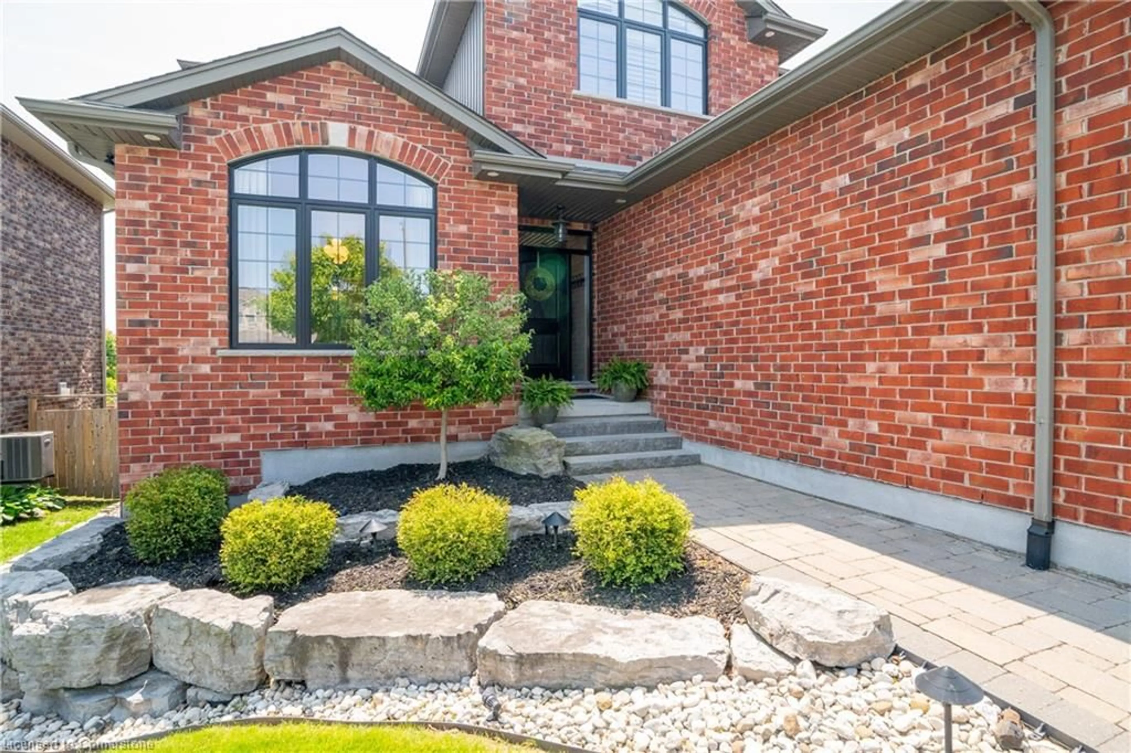 Home with brick exterior material, street for 61 Law Drive Dr, Guelph Ontario N1E 7J6