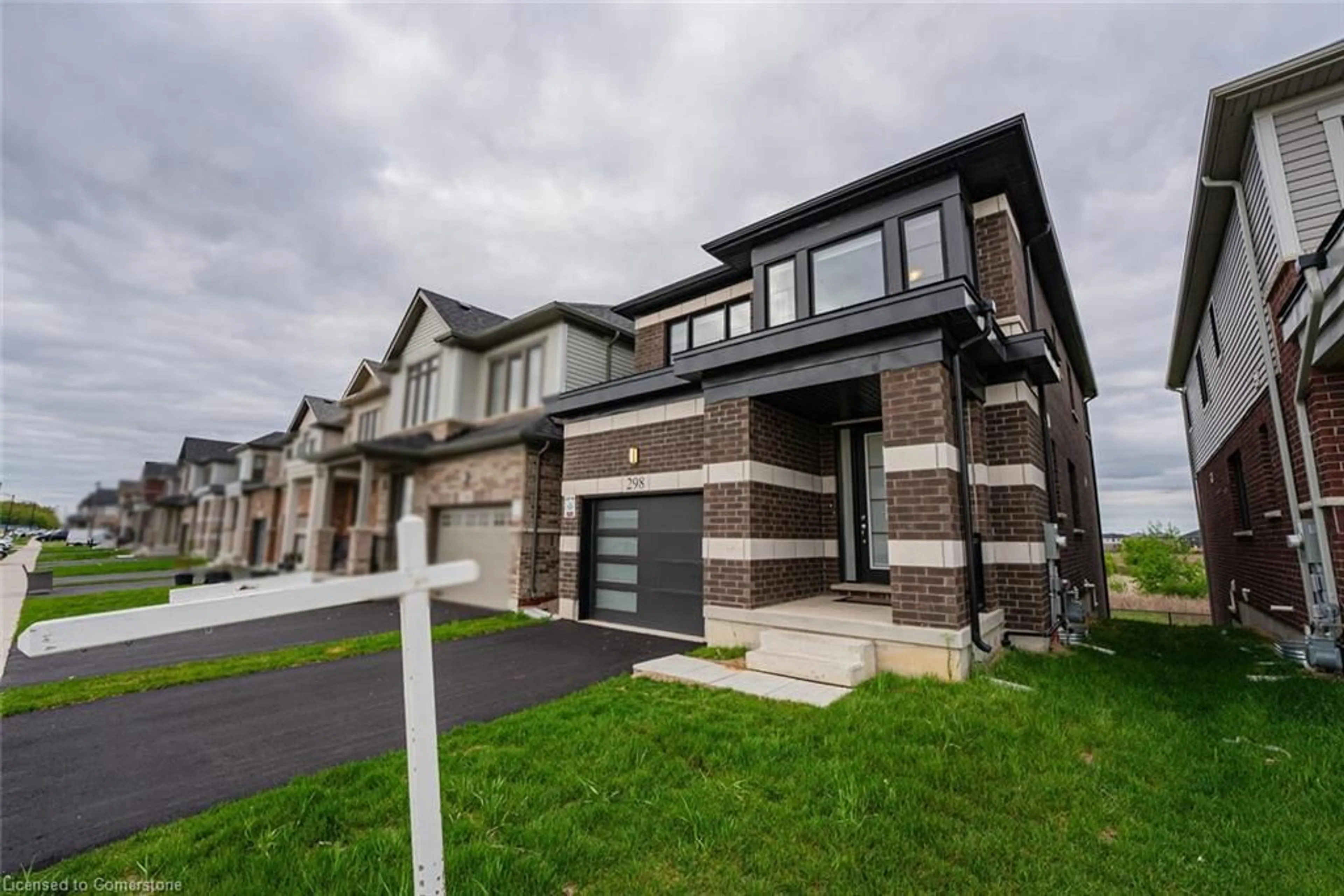 Home with brick exterior material, street for 298 Newman Dr, Cambridge Ontario N1S 0E1