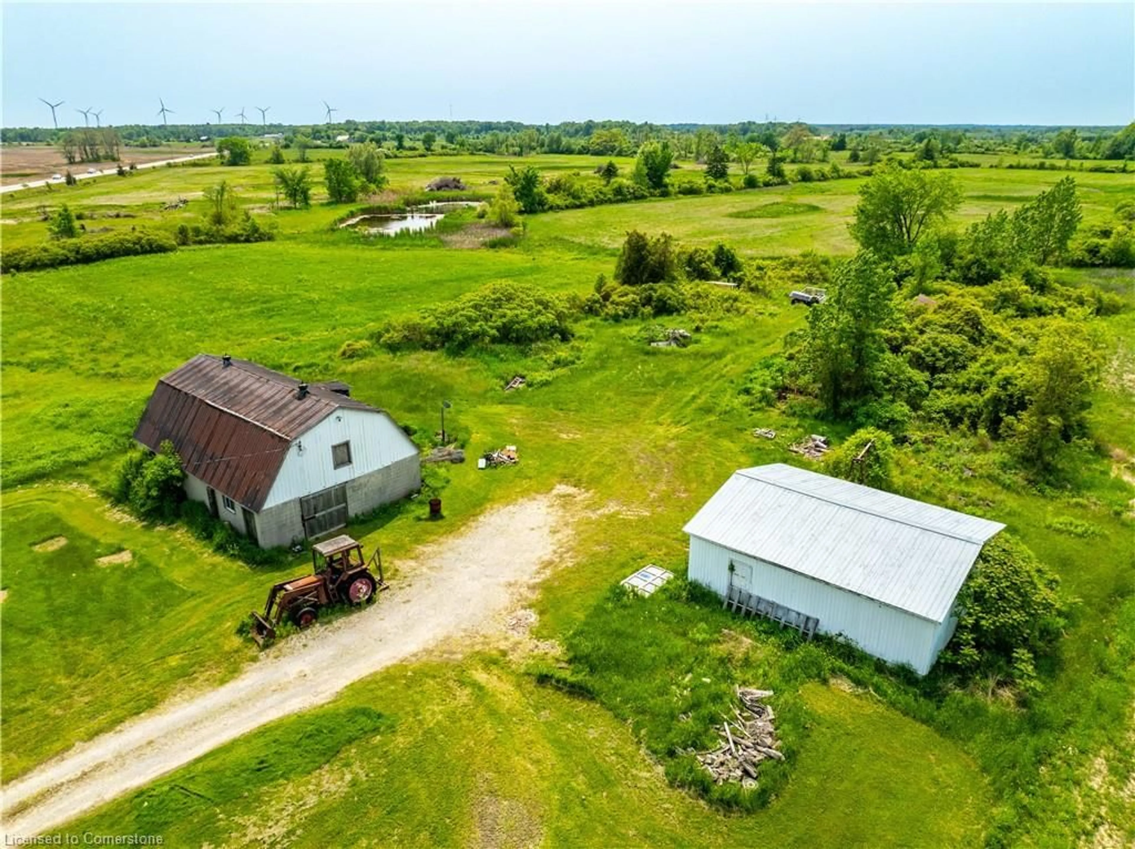 A pic from outside/outdoor area/front of a property/back of a property/a pic from drone, building for 2003 Highway 6, Port Dover Ontario N0A 1N1