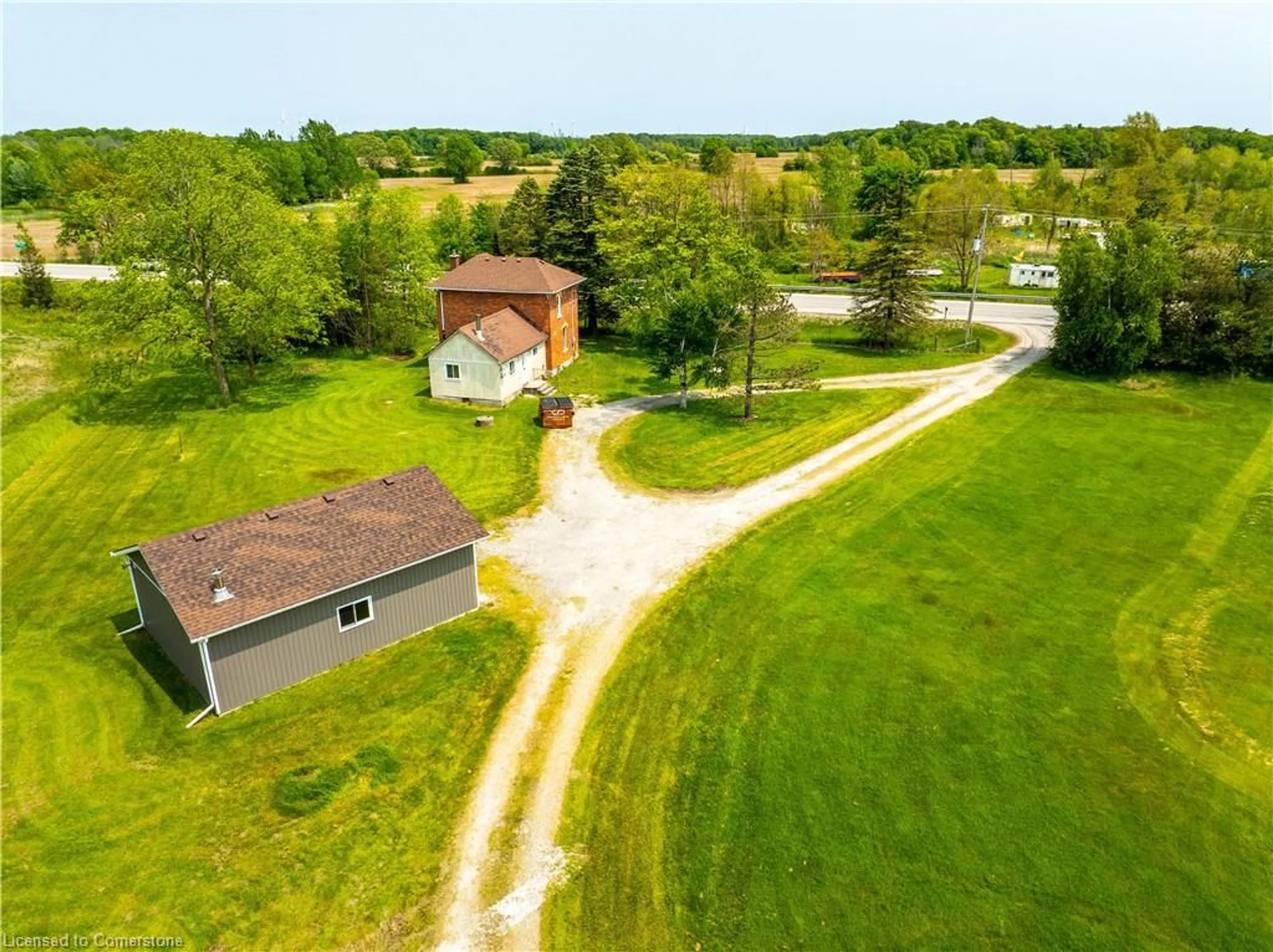 A pic from outside/outdoor area/front of a property/back of a property/a pic from drone, street for 2003 Highway 6, Port Dover Ontario N0A 1N1