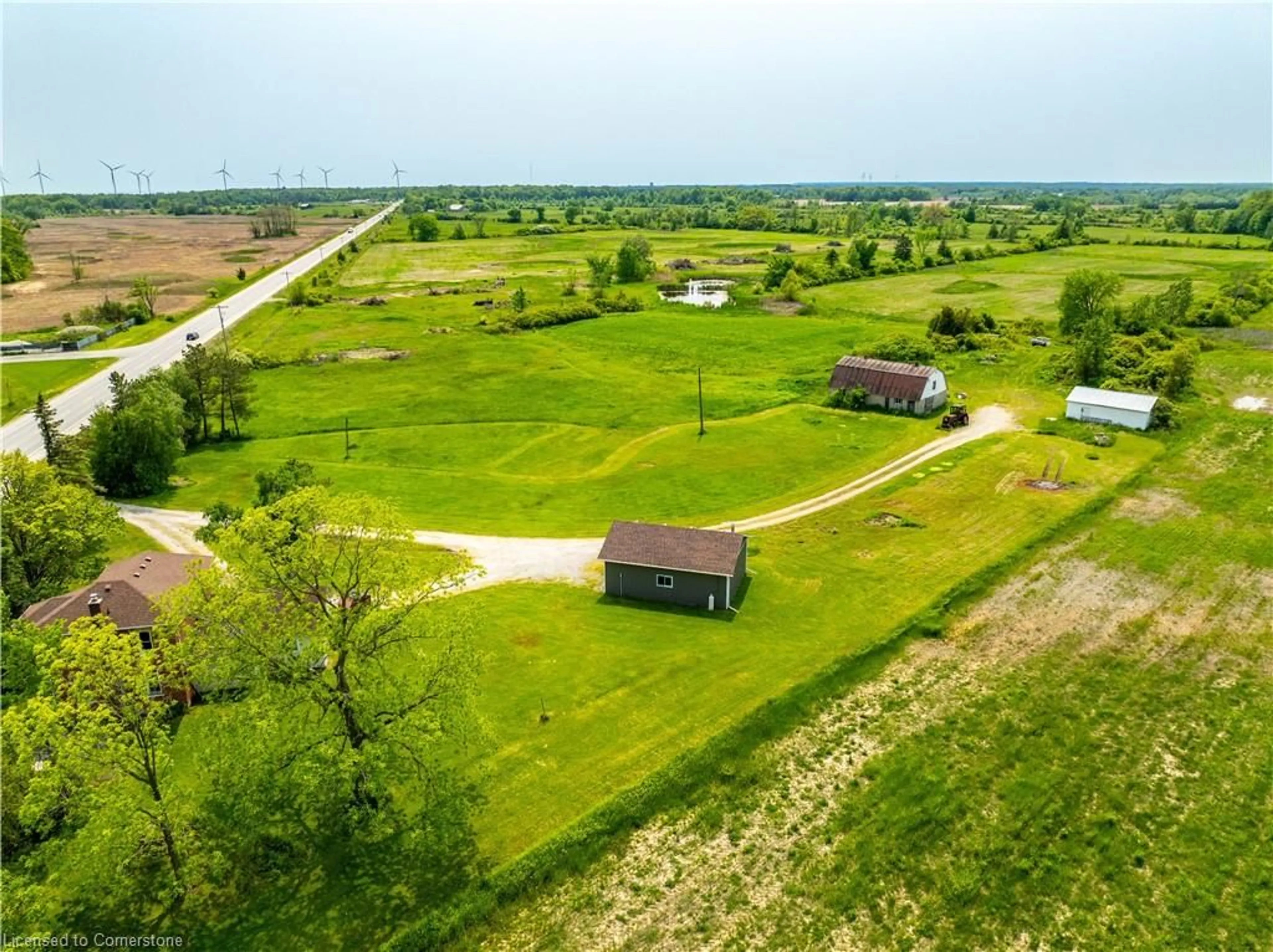 A pic from outside/outdoor area/front of a property/back of a property/a pic from drone, unknown for 2003 Highway 6, Port Dover Ontario N0A 1N1