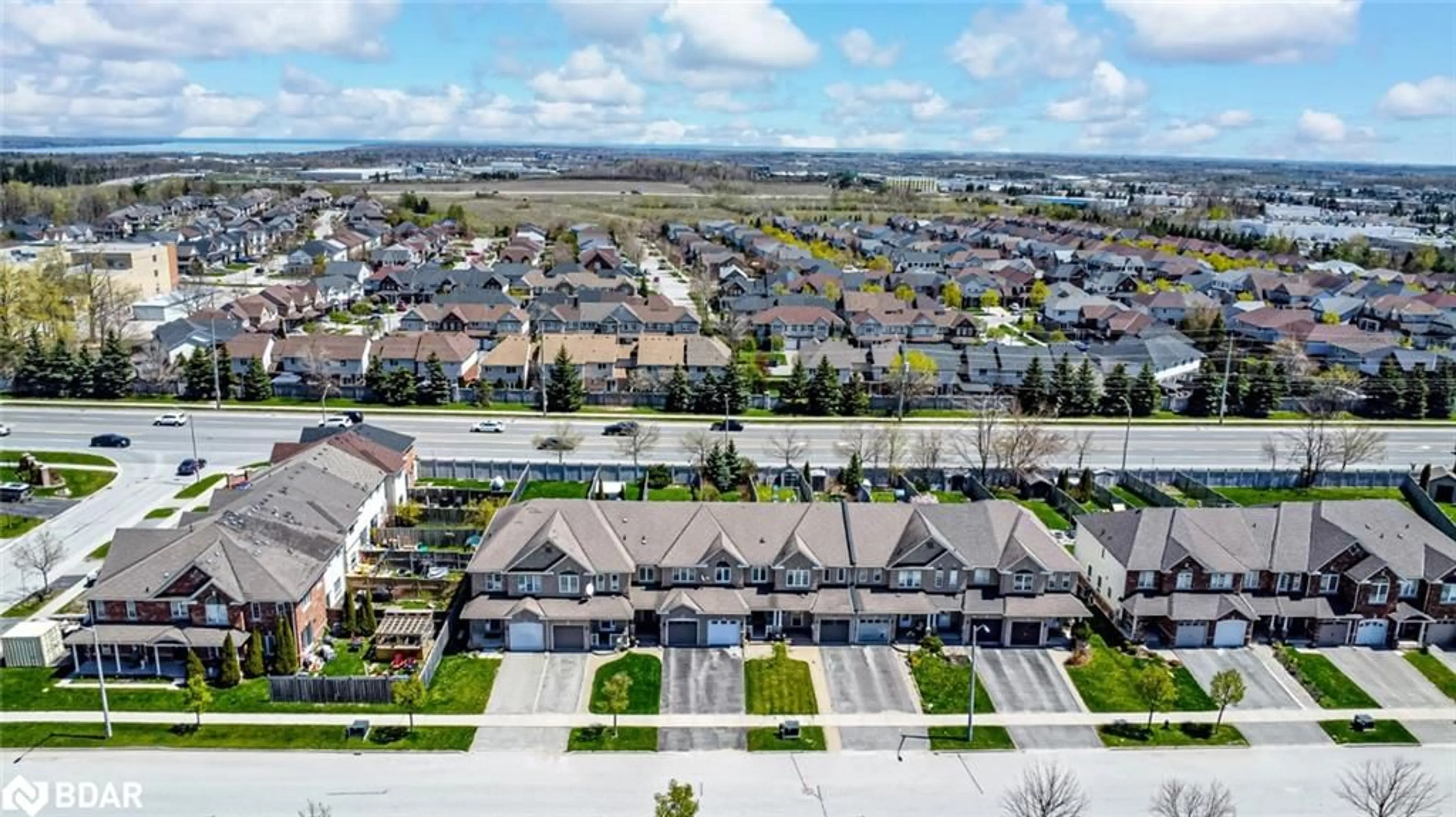 A pic from outside/outdoor area/front of a property/back of a property/a pic from drone, unknown for 11 Lake Cres, Barrie Ontario L4N 6A6