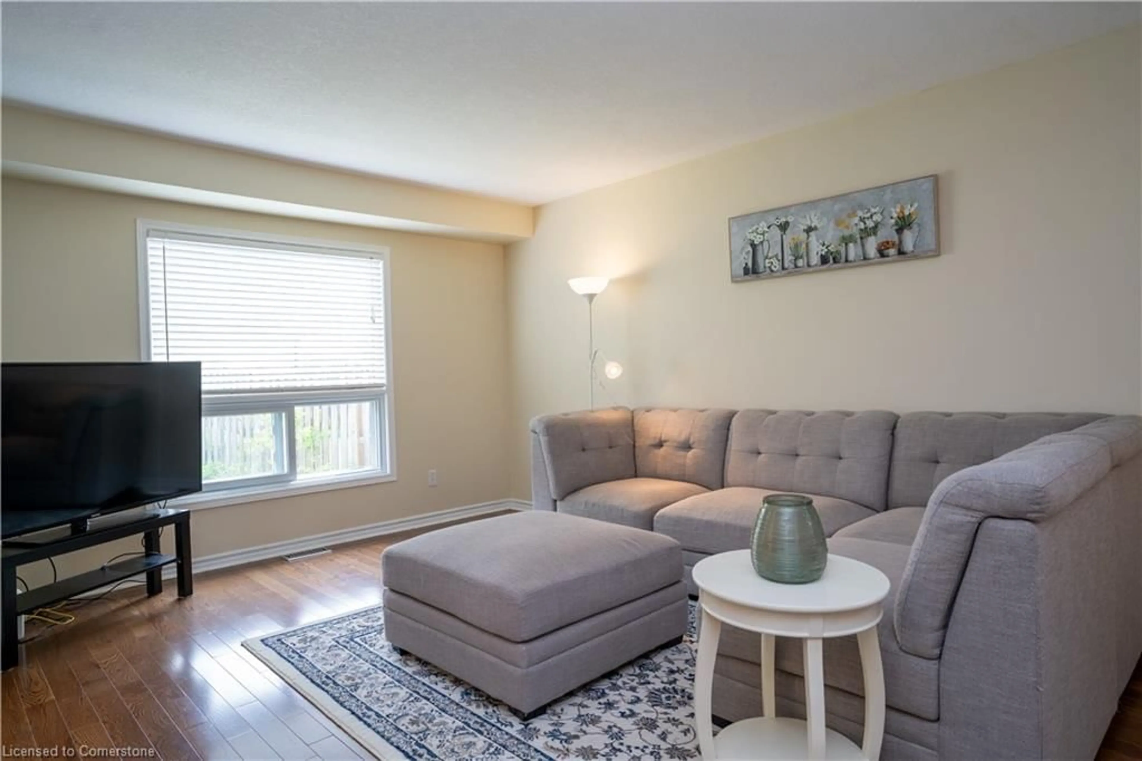Living room with furniture, wood/laminate floor for 620 Violet St, Waterloo Ontario N2V 2V9