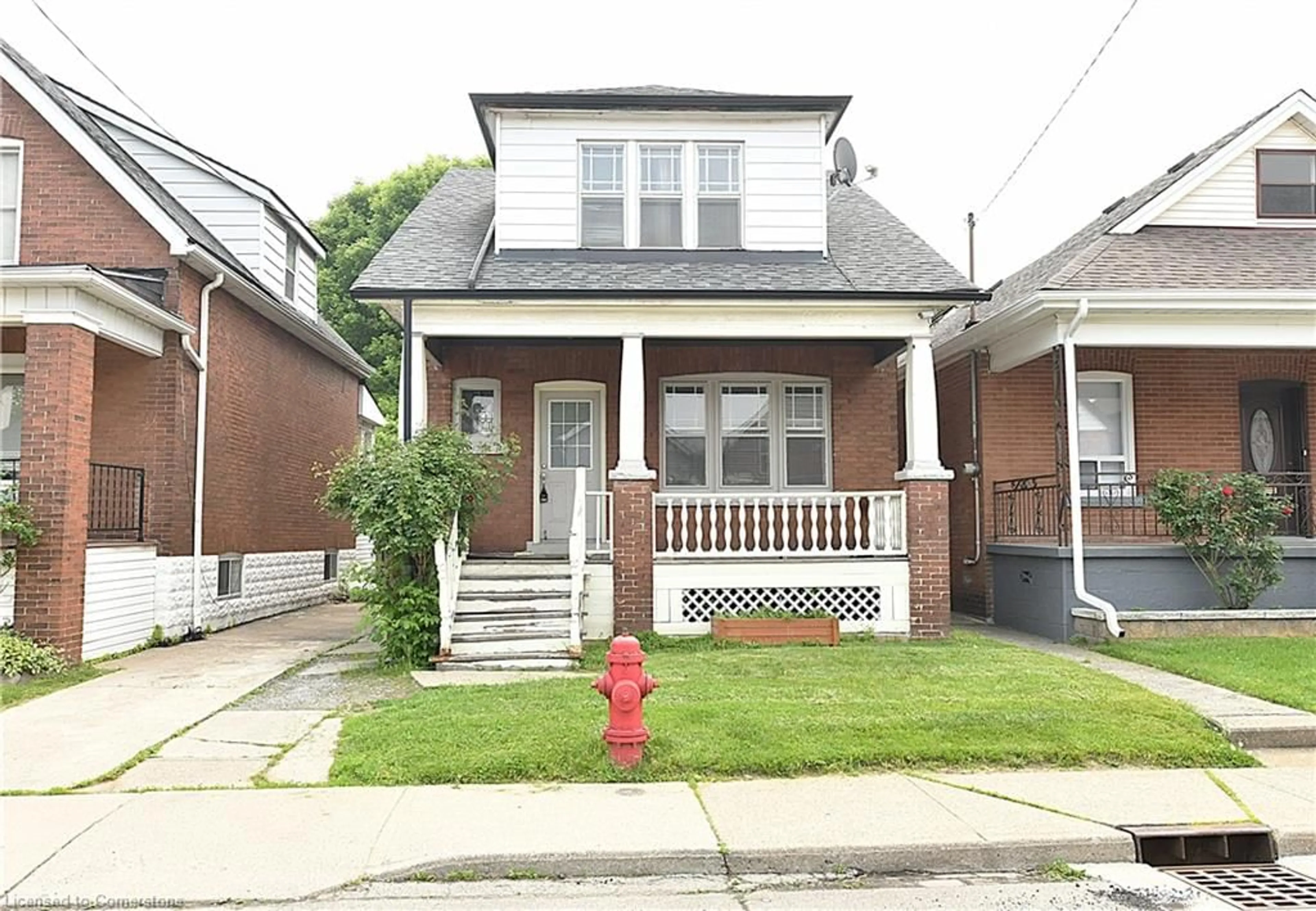 Home with brick exterior material, street for 106 Grosvenor Ave, Hamilton Ontario L8L 7S6