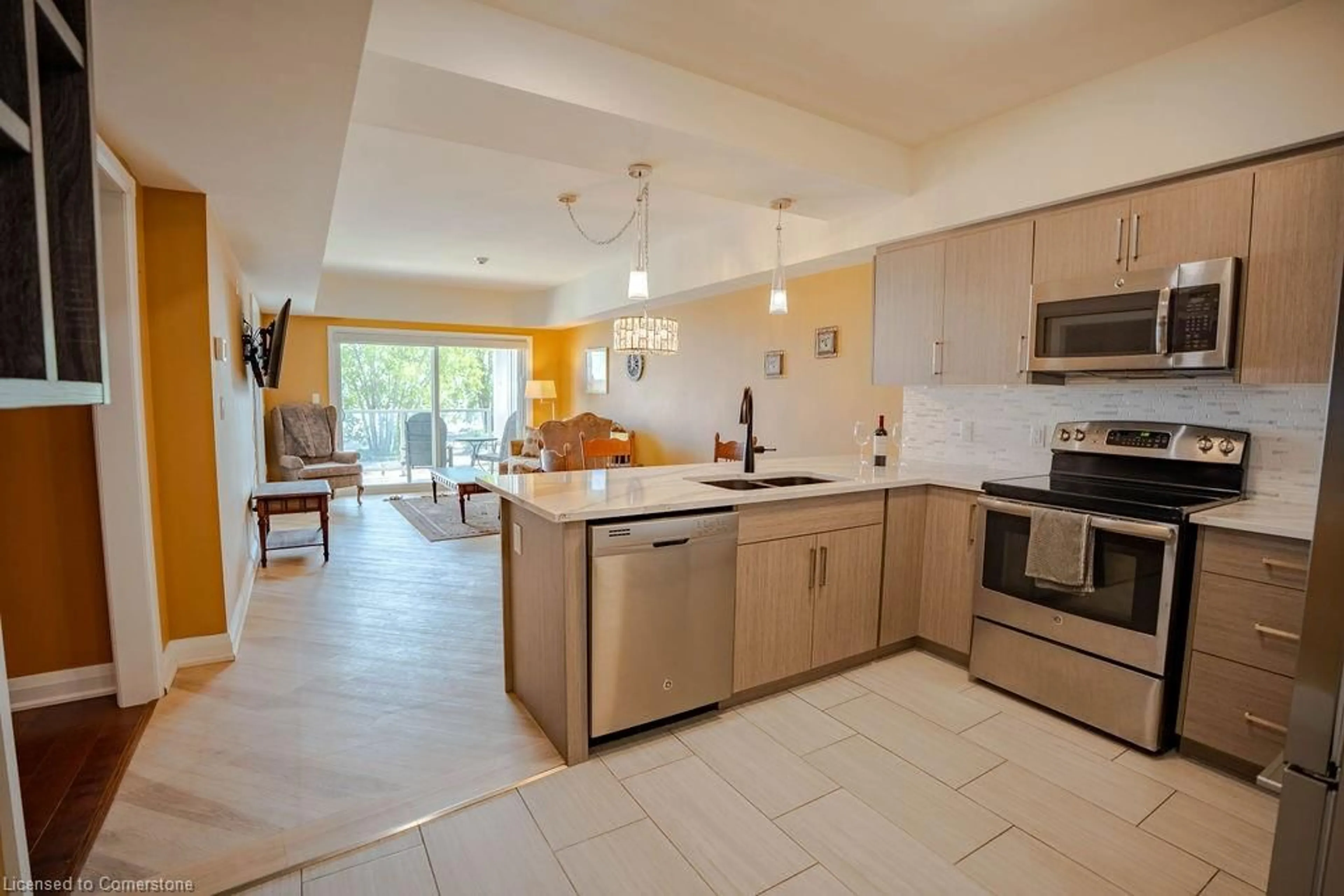 Open concept kitchen, ceramic/tile floor for 12 Erie Blvd #203, Long Point Ontario N0E 1M0