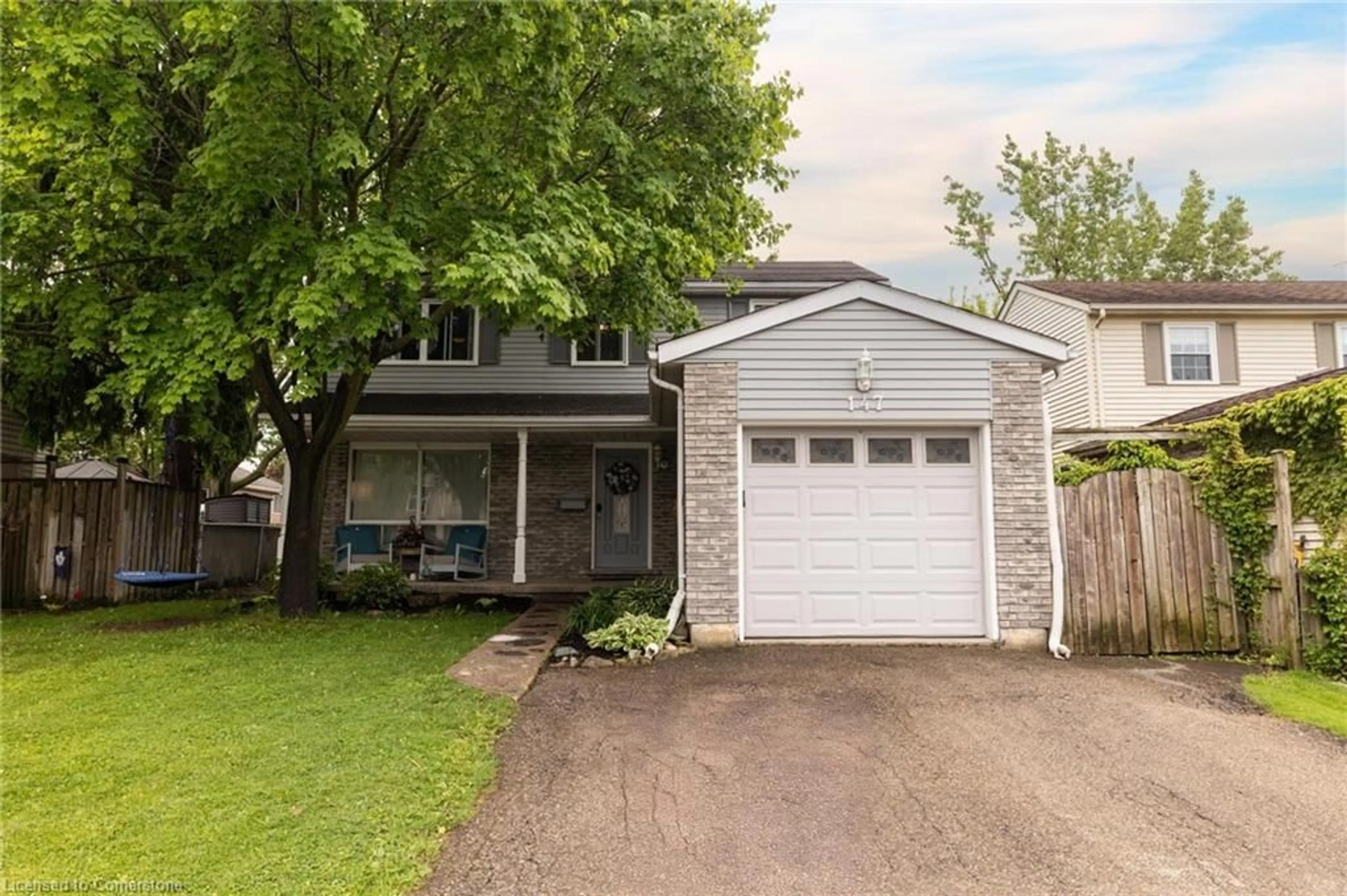 Home with vinyl exterior material, street for 147 Rolling Meadows Dr, Kitchener Ontario N2N 1X8