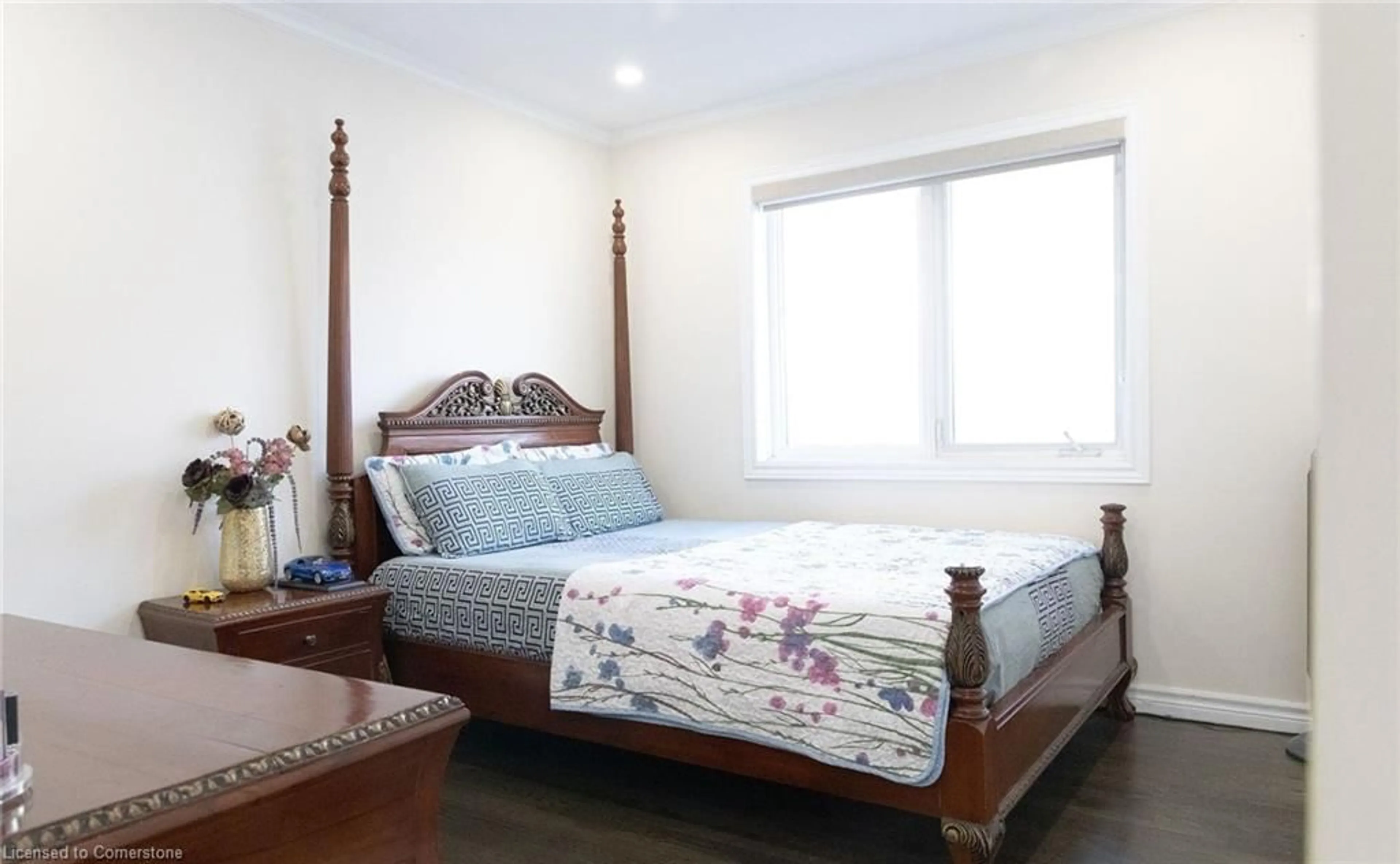 Bedroom with bed, wood/laminate floor for 99 Donnici Dr, Hamilton Ontario L9B 2K3