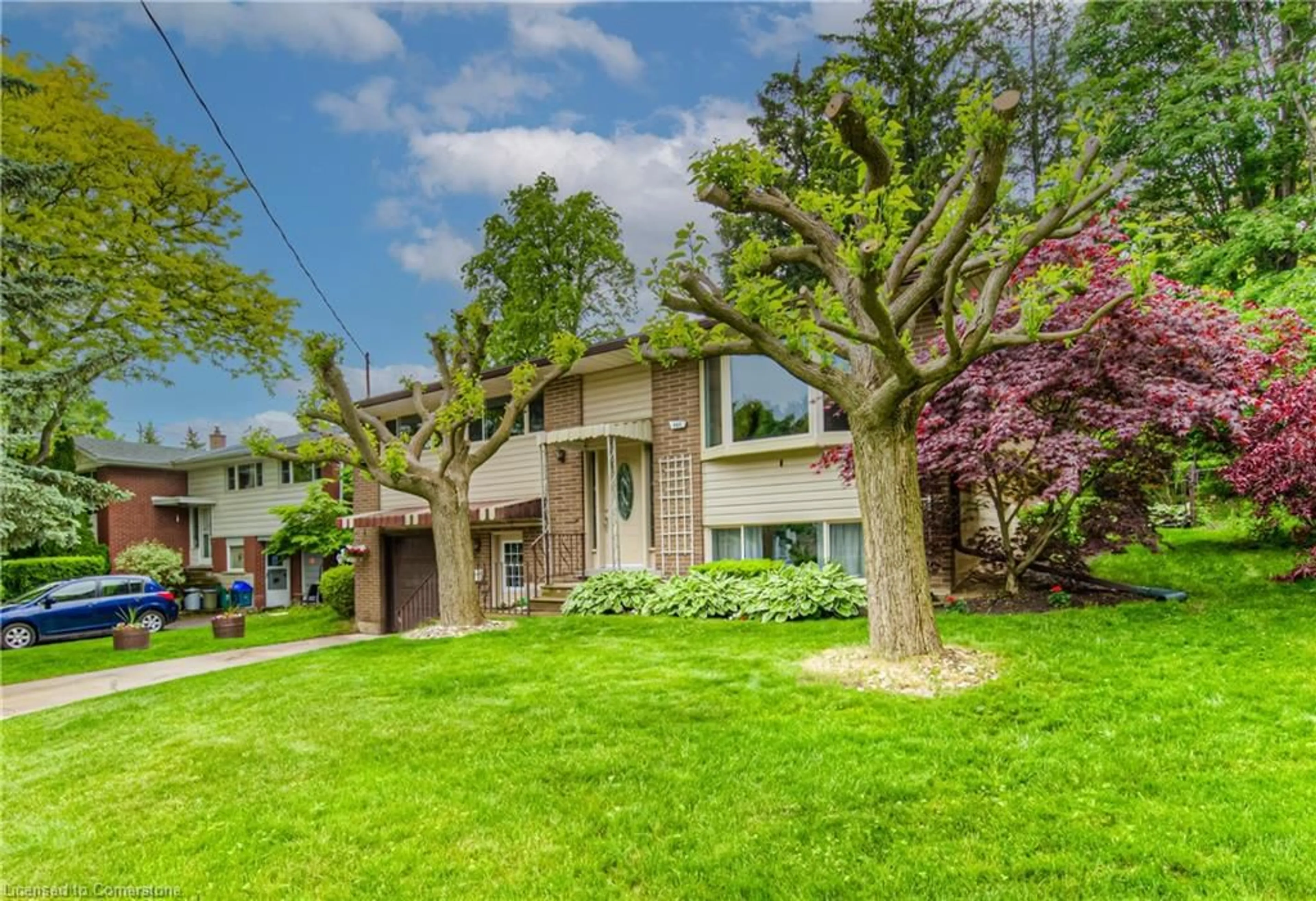 Home with brick exterior material, street for 448 Greenbrook Dr, Kitchener Ontario N2M 4K4