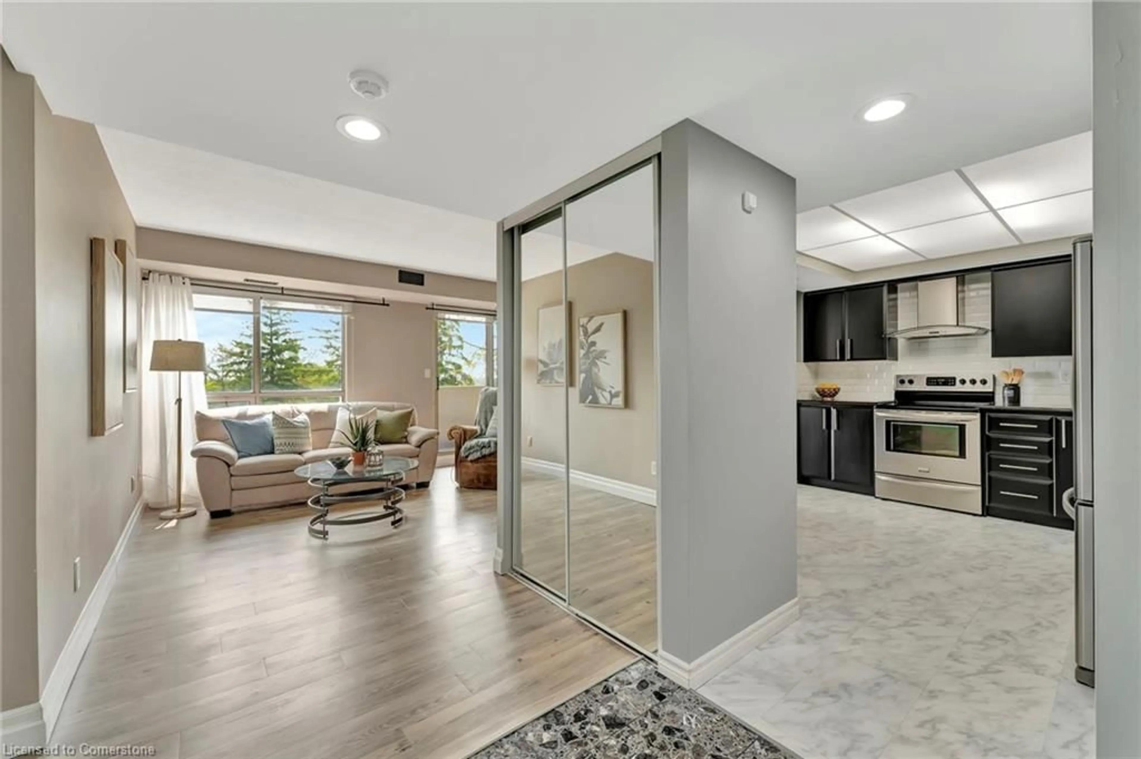Open concept kitchen, ceramic/tile floor for 3267 King St #404, Kitchener Ontario N2A 4A4