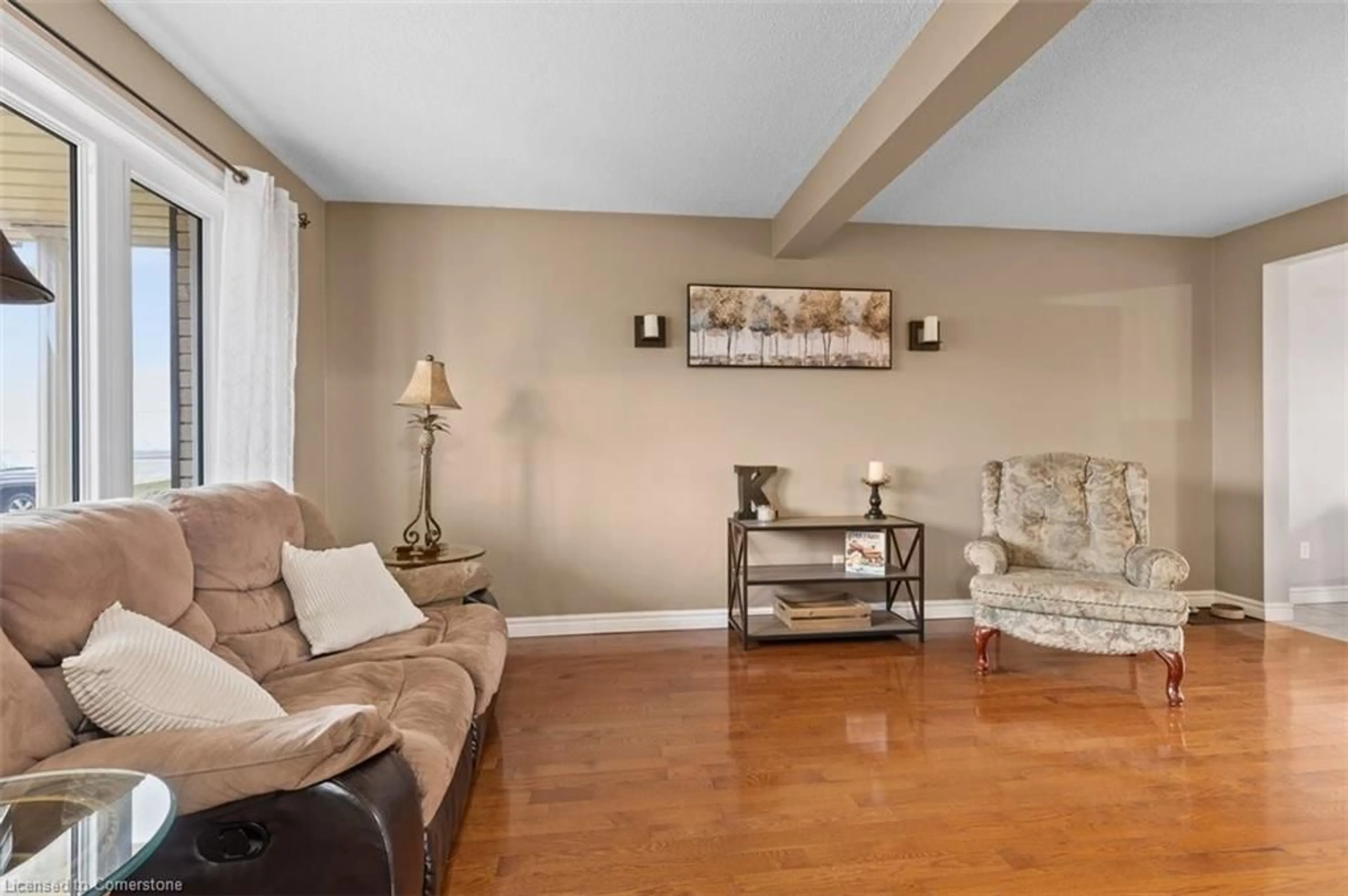 Living room with furniture, wood/laminate floor for 10 Hewitt St, Bright Ontario N0J 1B0