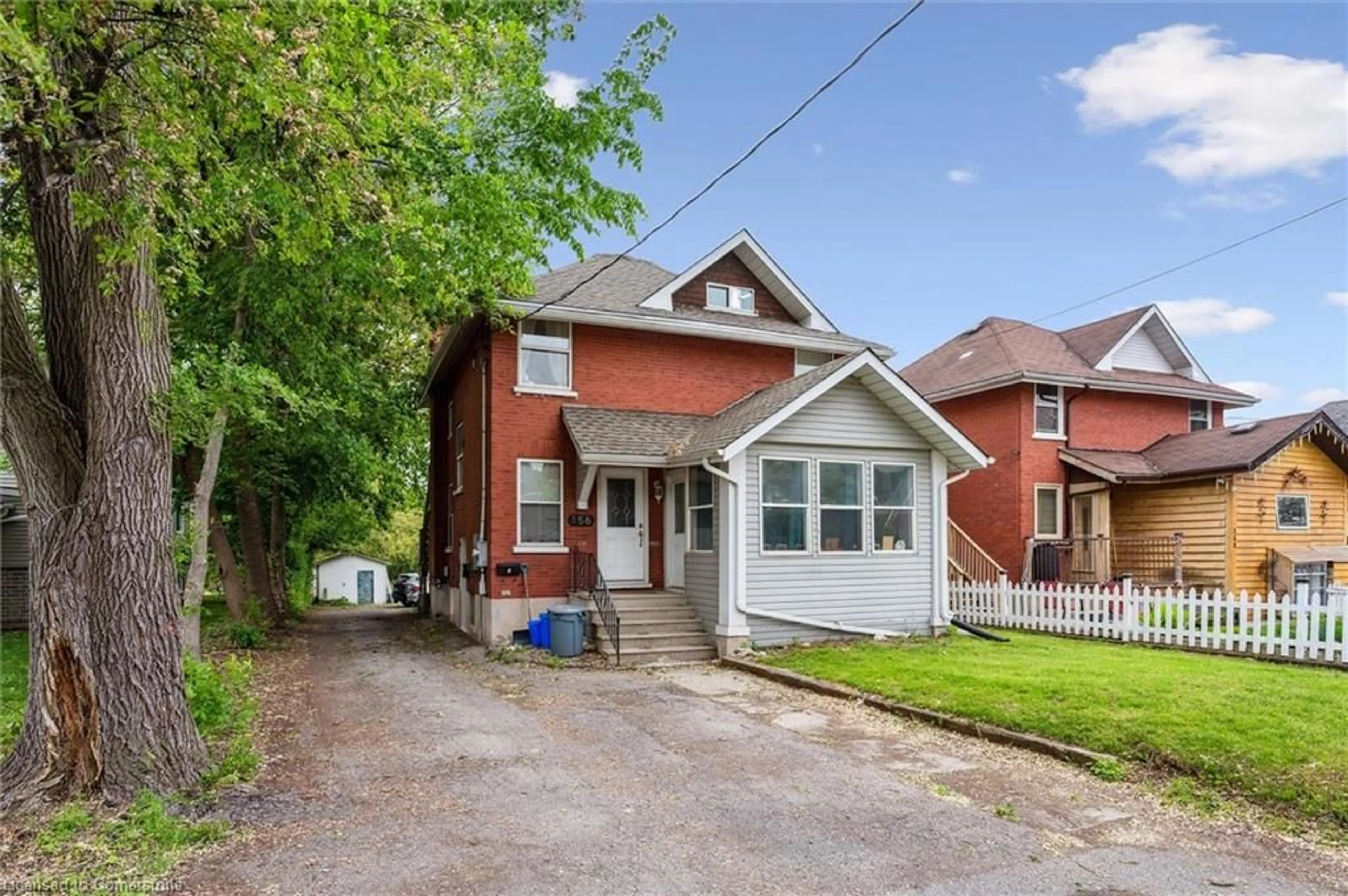 Home with brick exterior material, street for 156 Mill St, Kitchener Ontario N2M 3P8