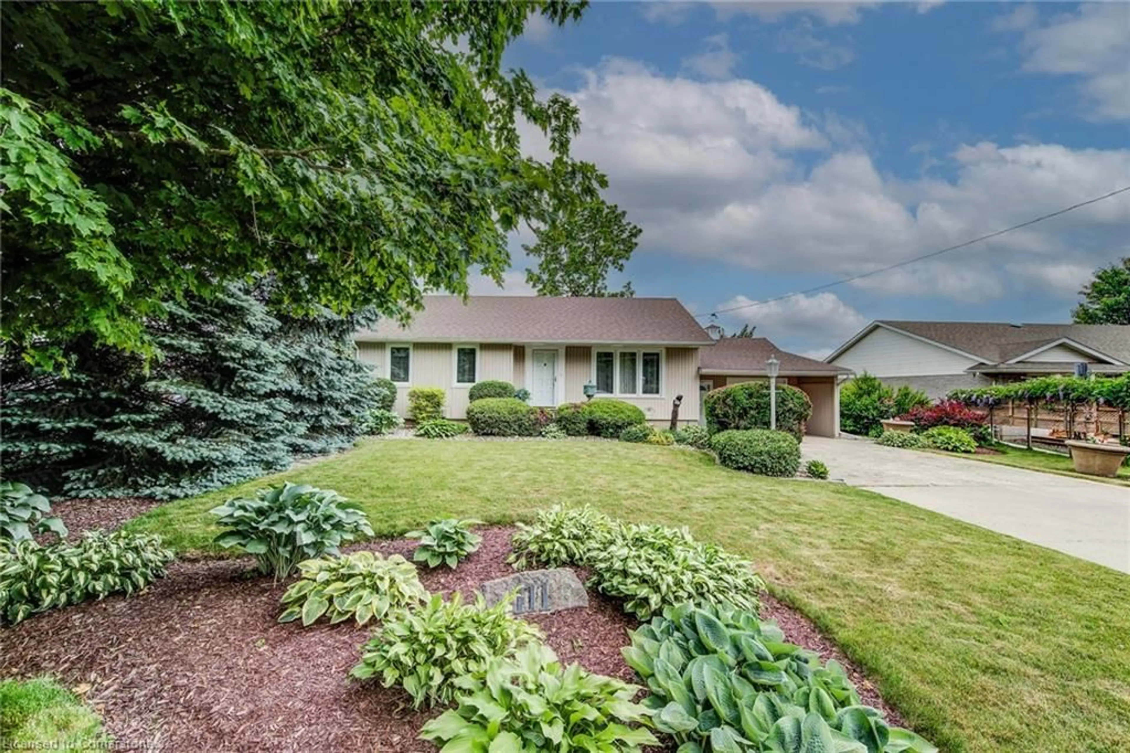 Home with vinyl exterior material, street for 111 William St, Tavistock Ontario N0B 2R0