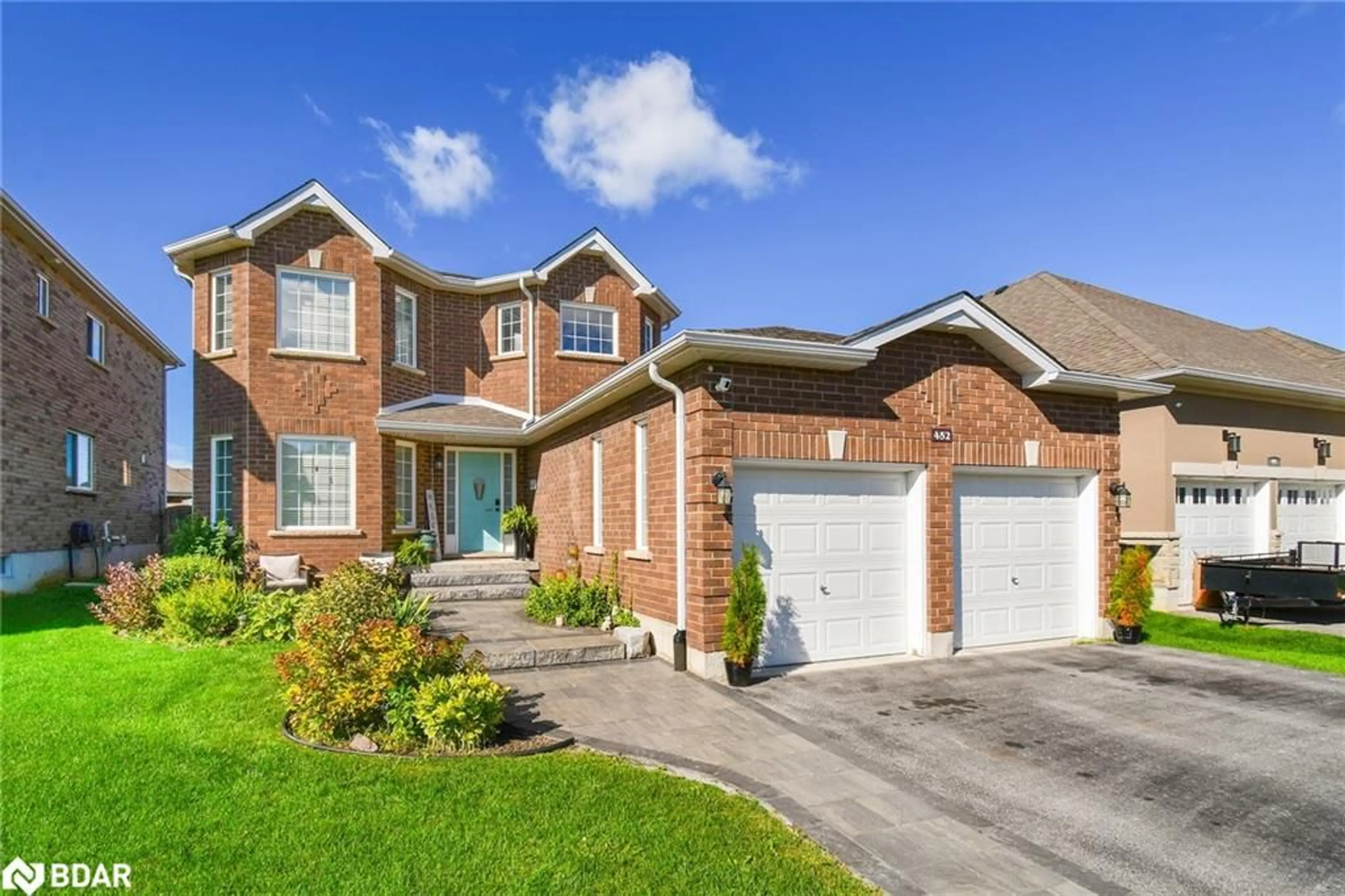 Home with brick exterior material, street for 452 Greenwood Dr, Essa Ontario L0M 1B6