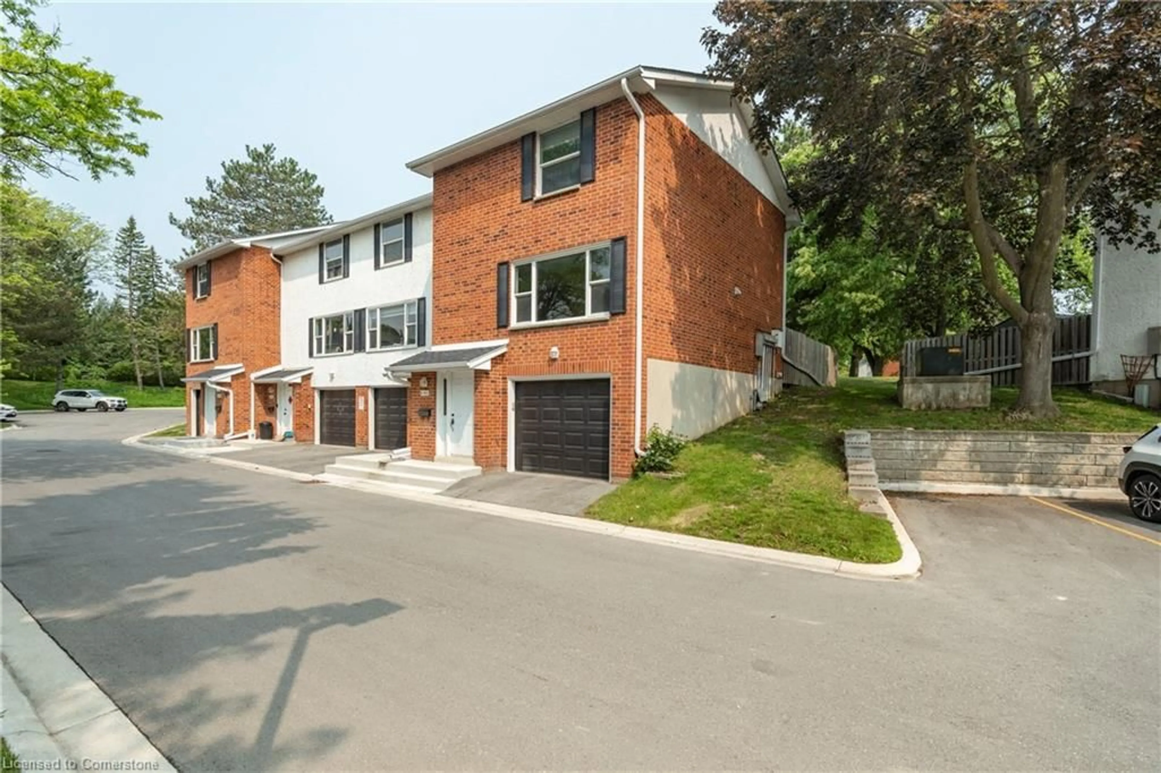 Home with brick exterior material, street for 411 Keats Way #4, Waterloo Ontario N2L 5S7