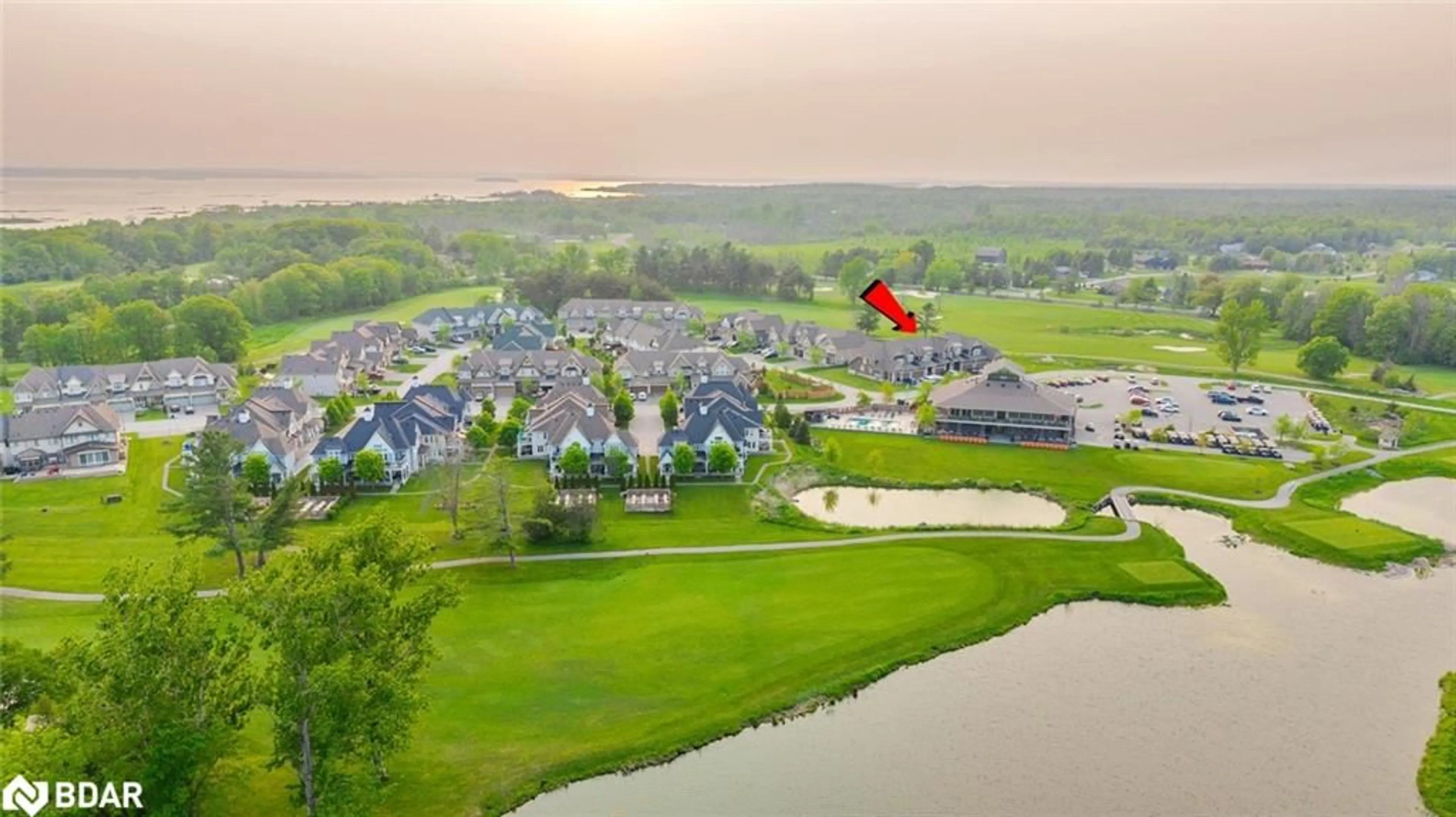 A pic from outside/outdoor area/front of a property/back of a property/a pic from drone, water/lake/river/ocean view for 76 Links Trail, Port Severn Ontario L0K 1S0