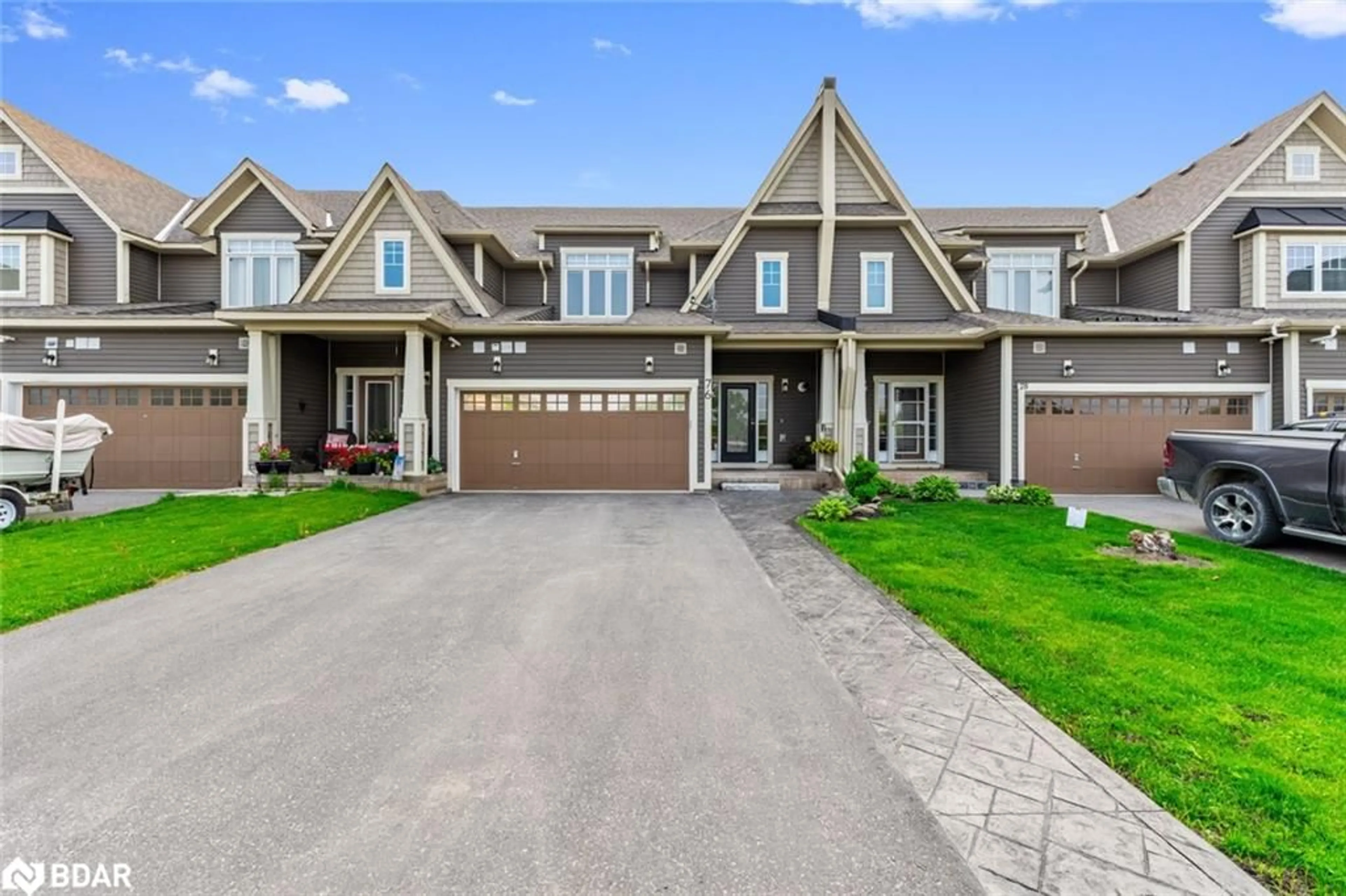 Home with brick exterior material, street for 76 Links Trail, Port Severn Ontario L0K 1S0