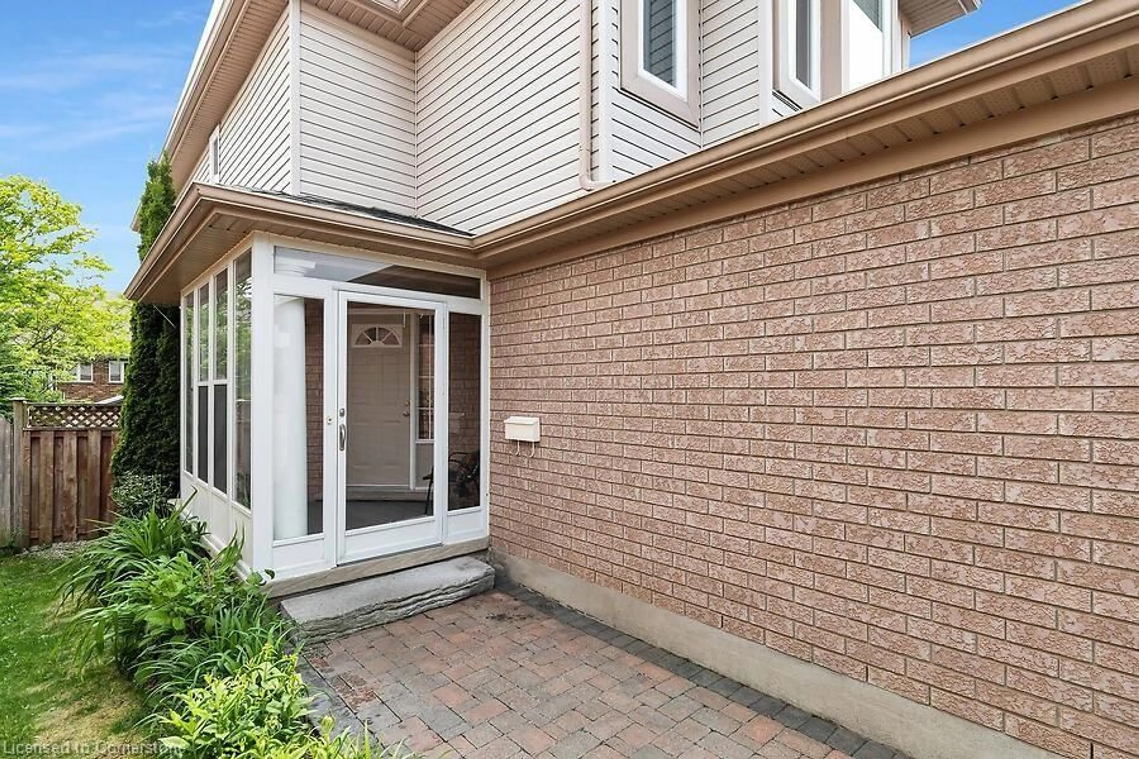 Home with brick exterior material, street for 105 Southcreek Trail, Guelph Ontario N1G 5A7