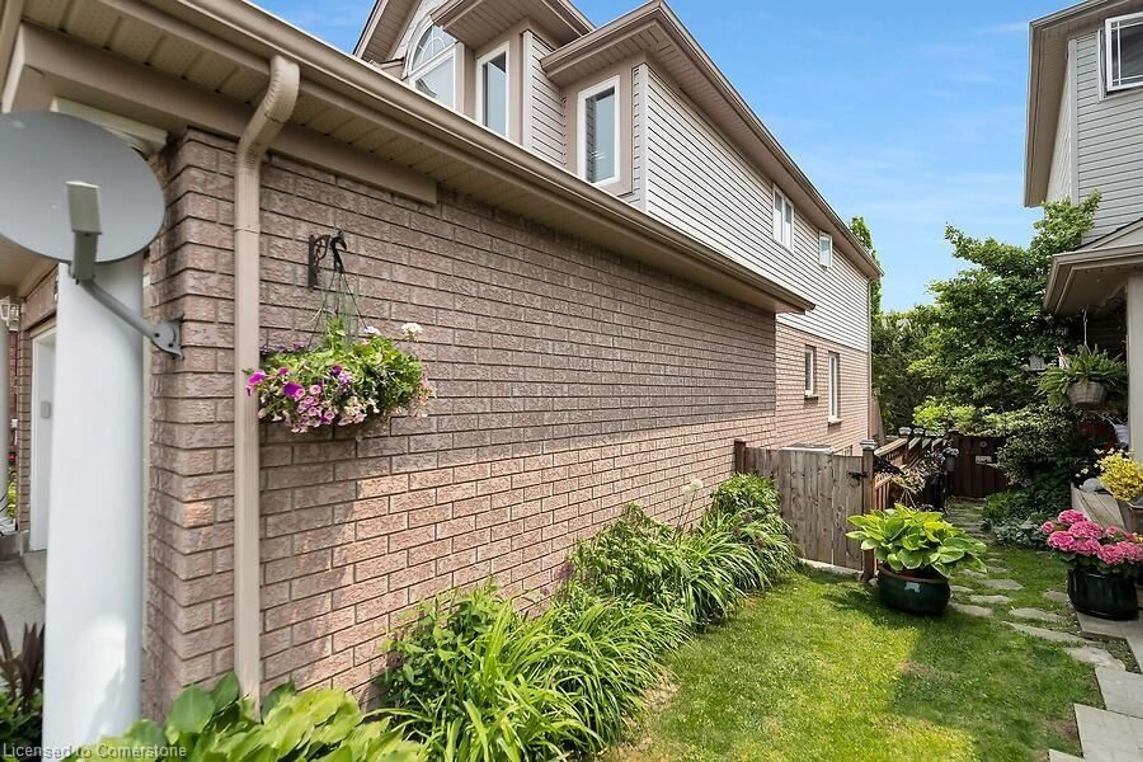 Home with brick exterior material, street for 105 Southcreek Trail, Guelph Ontario N1G 5A7