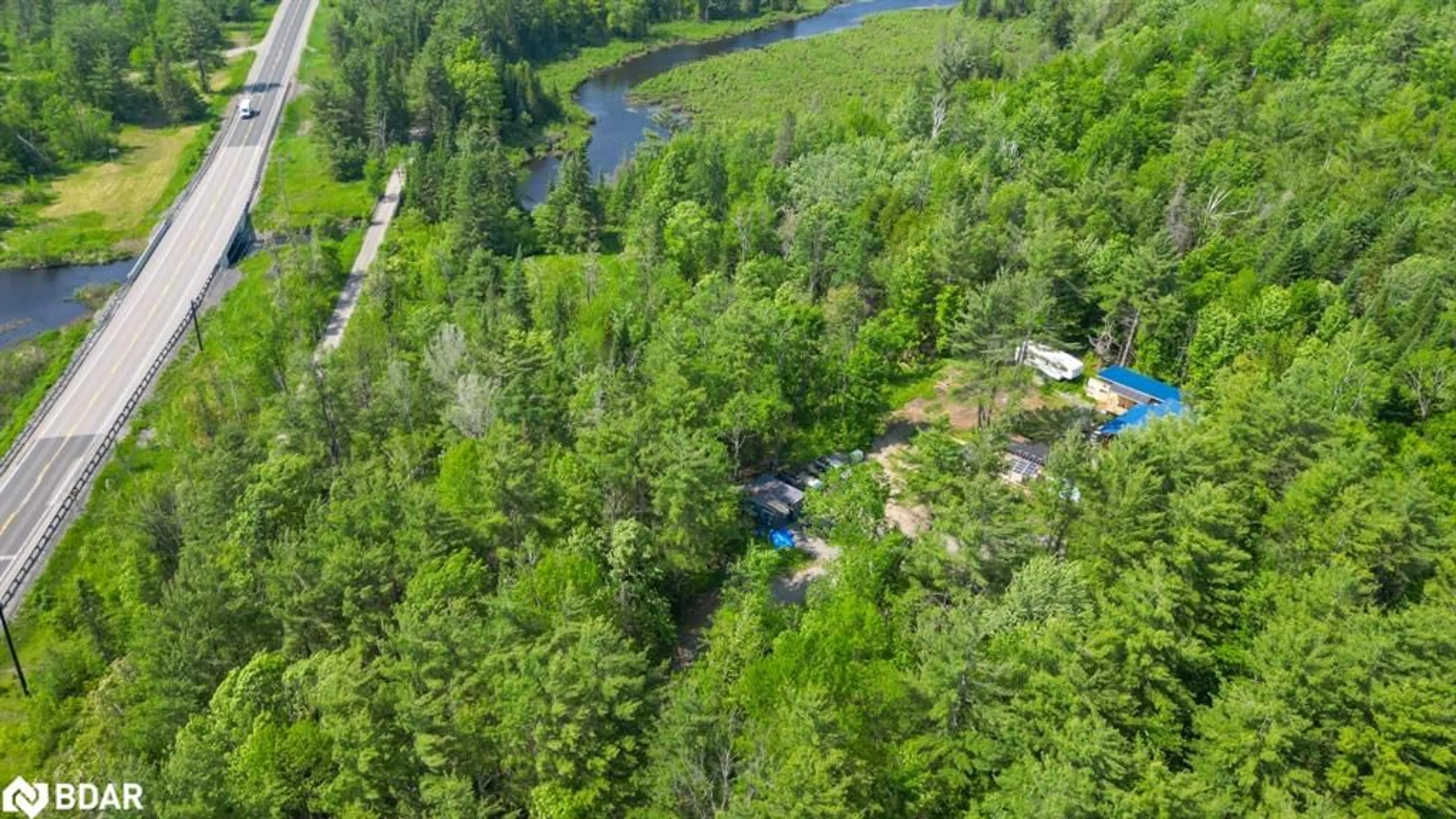 A pic from outside/outdoor area/front of a property/back of a property/a pic from drone, forest/trees view for 4 WOLF LAKE Wolf Lake Rd, Madoc Ontario K0K 1Y0