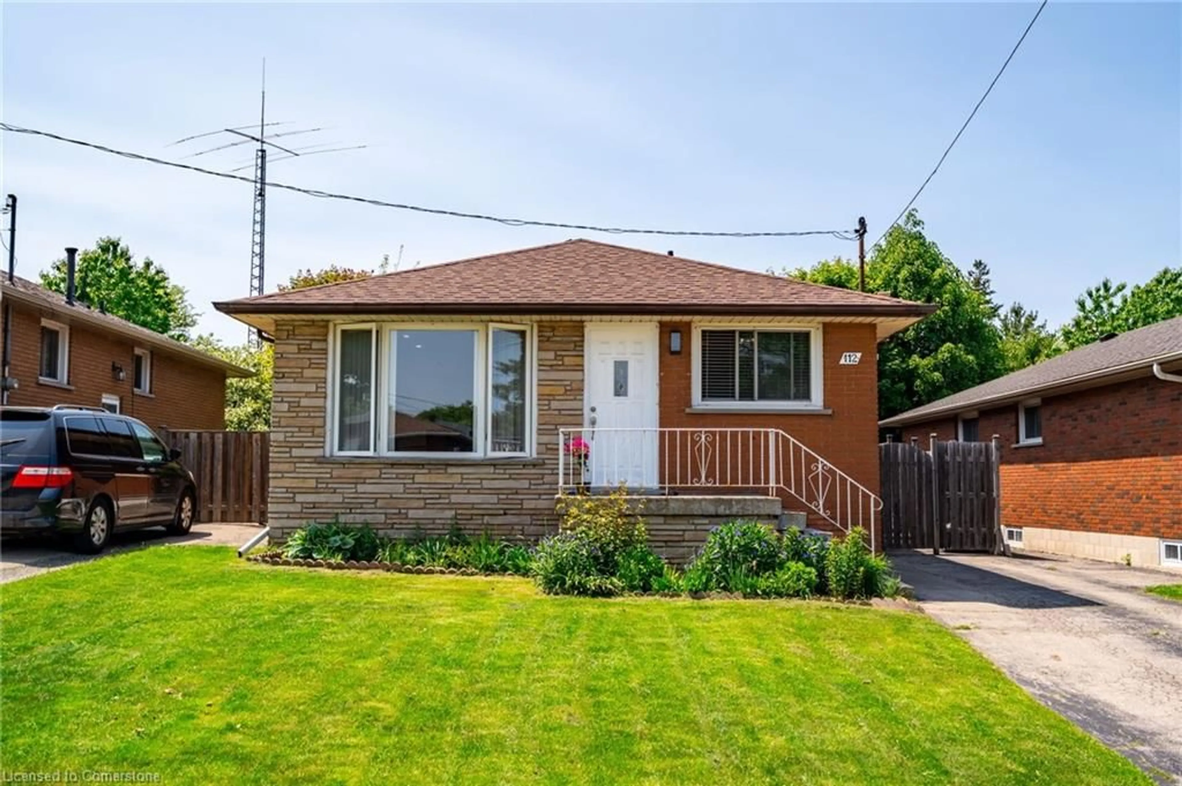 Home with brick exterior material, street for 112 Greeningdon Dr, Hamilton Ontario L9A 4W7