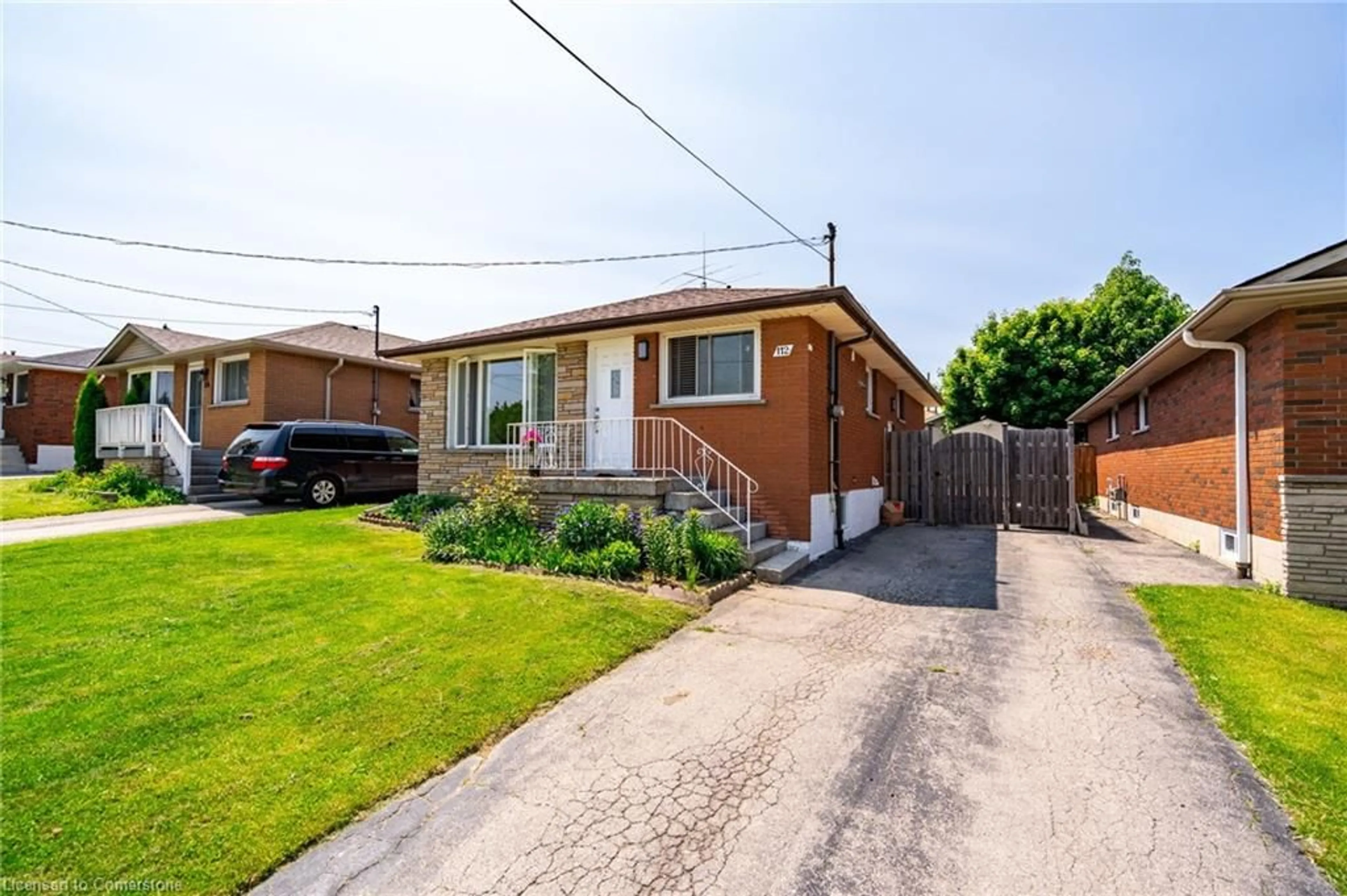 Home with brick exterior material, street for 112 Greeningdon Dr, Hamilton Ontario L9A 4W7