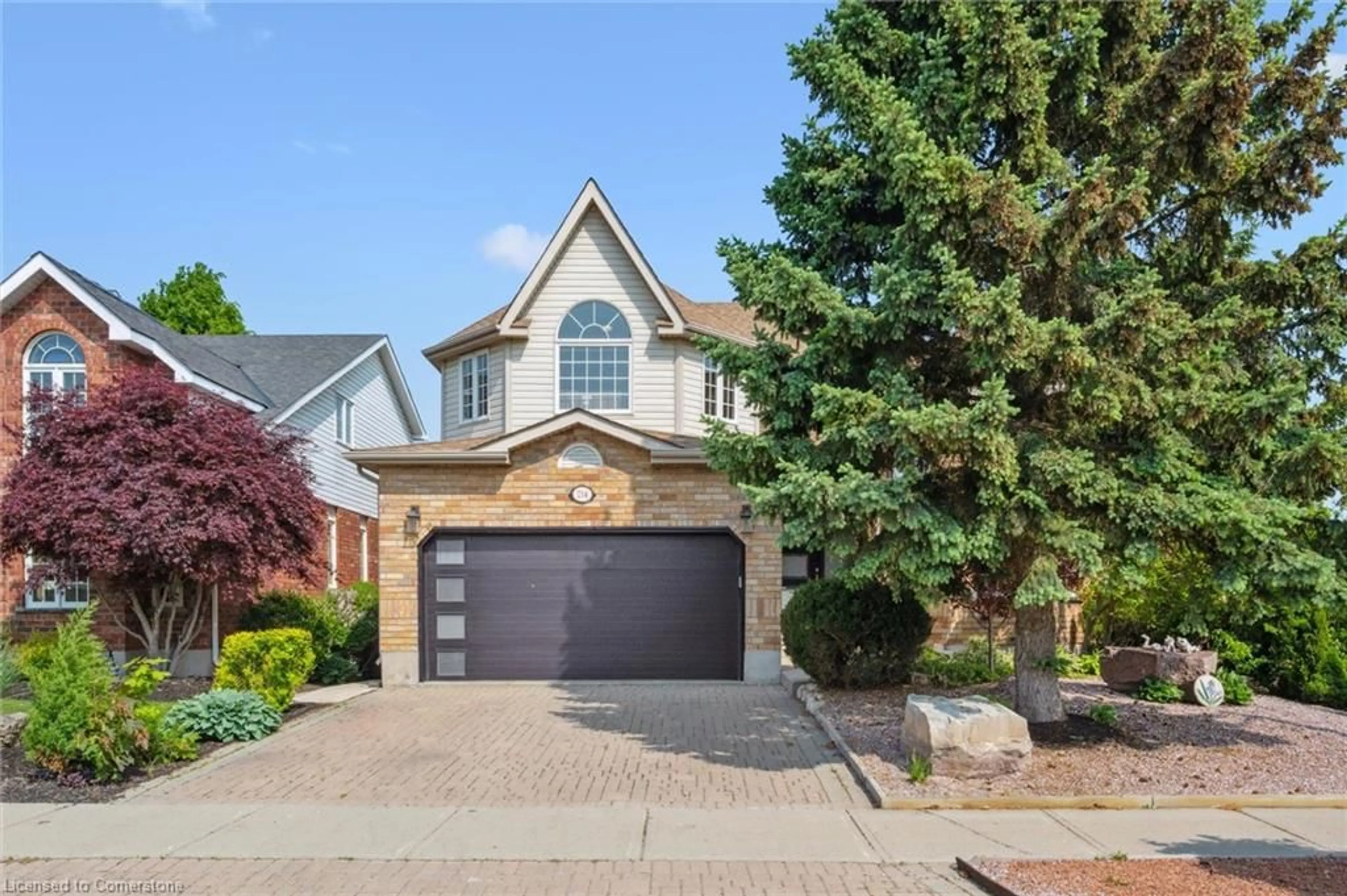 Home with brick exterior material, street for 214 Summerfield Dr, Guelph Ontario N1L 1L3