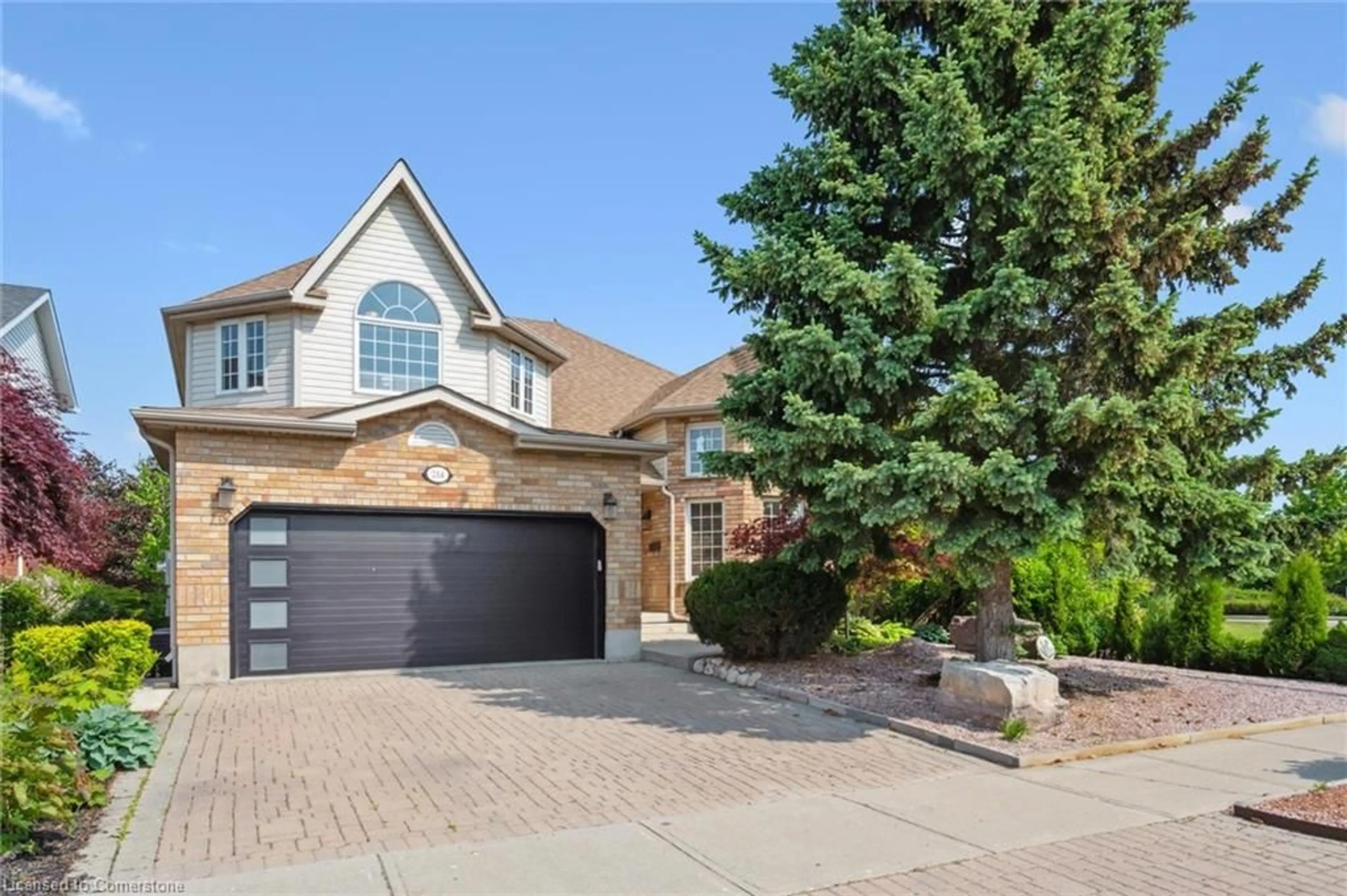 Home with brick exterior material, street for 214 Summerfield Dr, Guelph Ontario N1L 1L3
