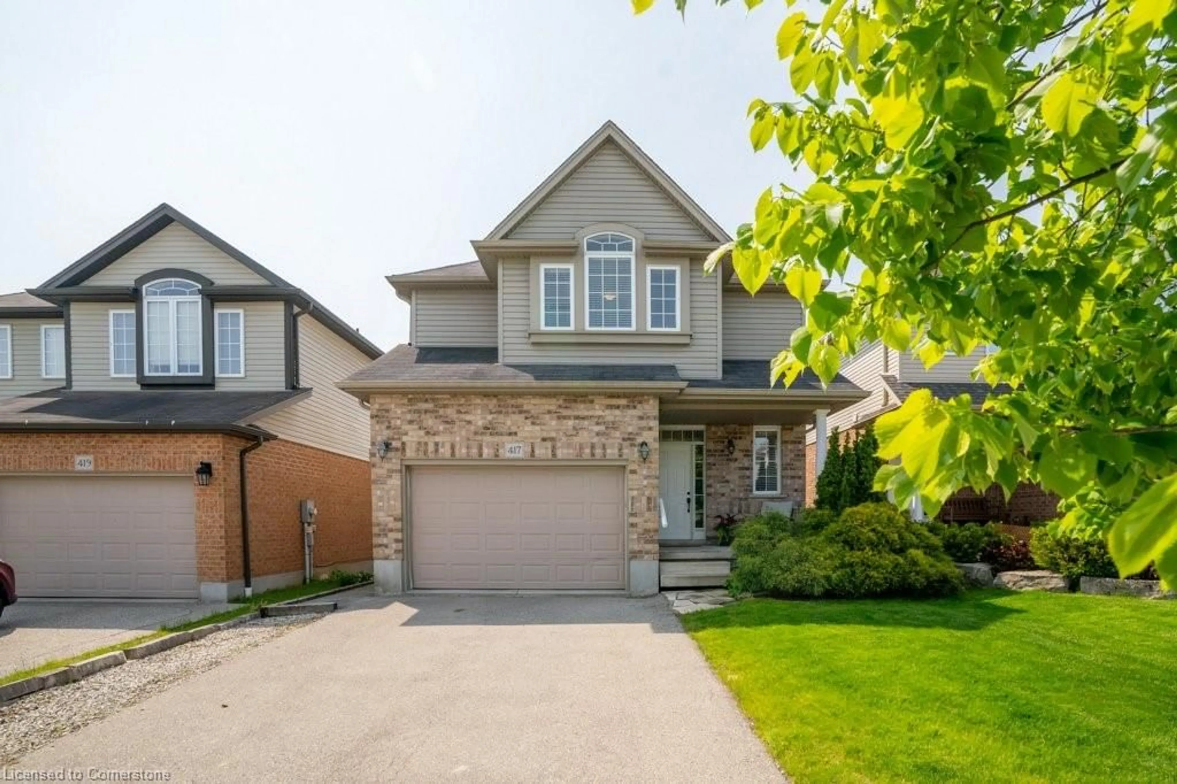 Home with brick exterior material, street for 417 Westcroft Dr, Waterloo Ontario N2T 2Z9