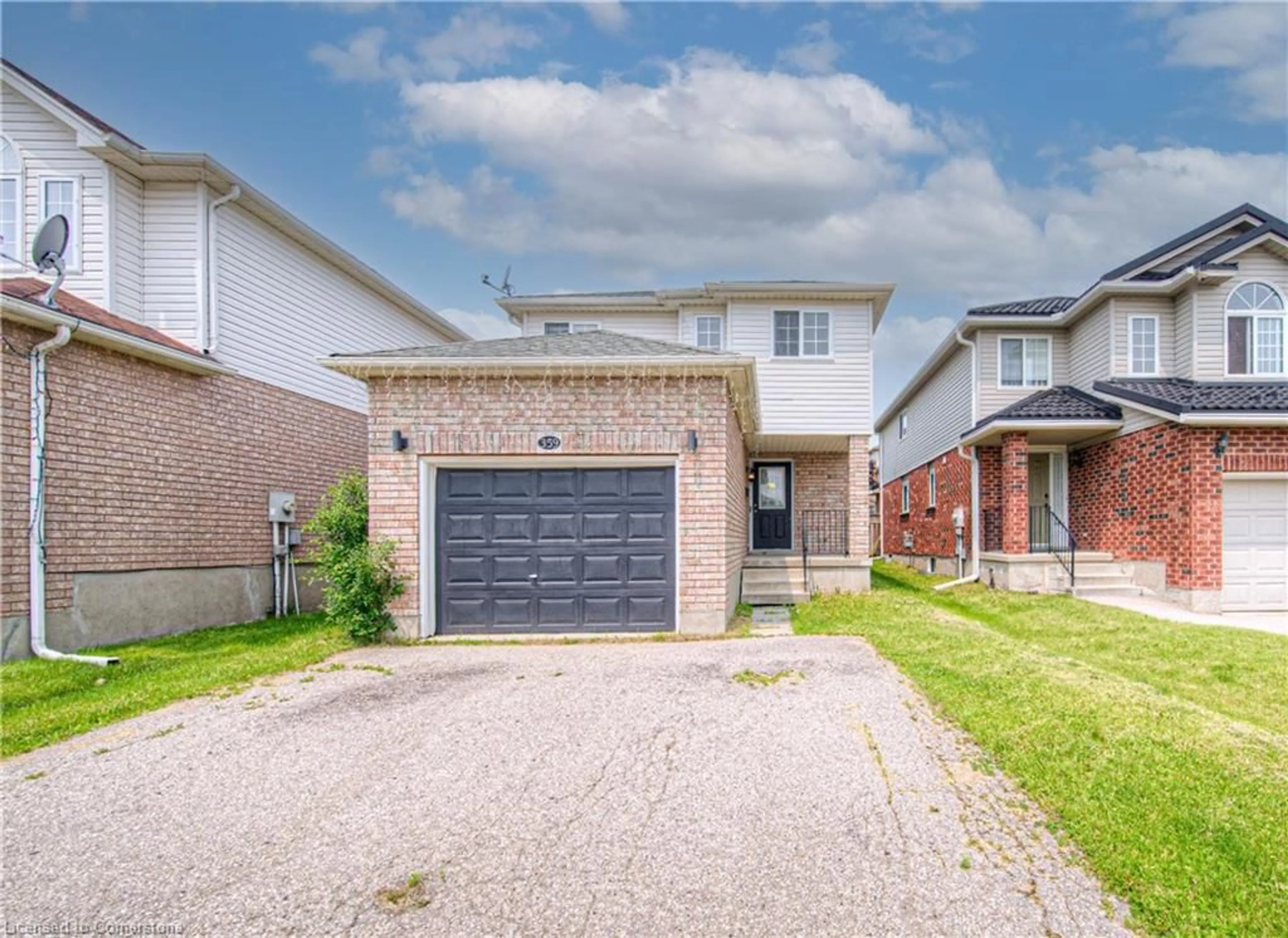 Home with brick exterior material, street for 359 Hidden Creek Dr, Kitchener Ontario N2N 3N3