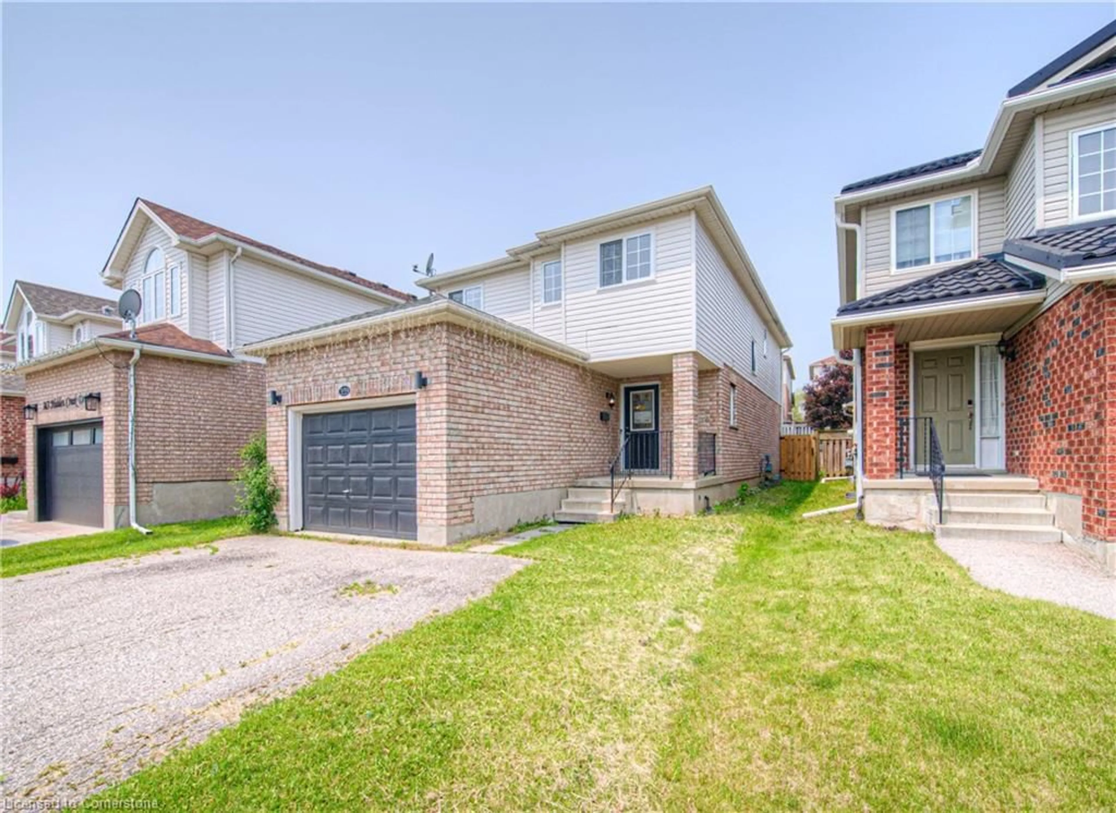 Home with brick exterior material, street for 359 Hidden Creek Dr, Kitchener Ontario N2N 3N3