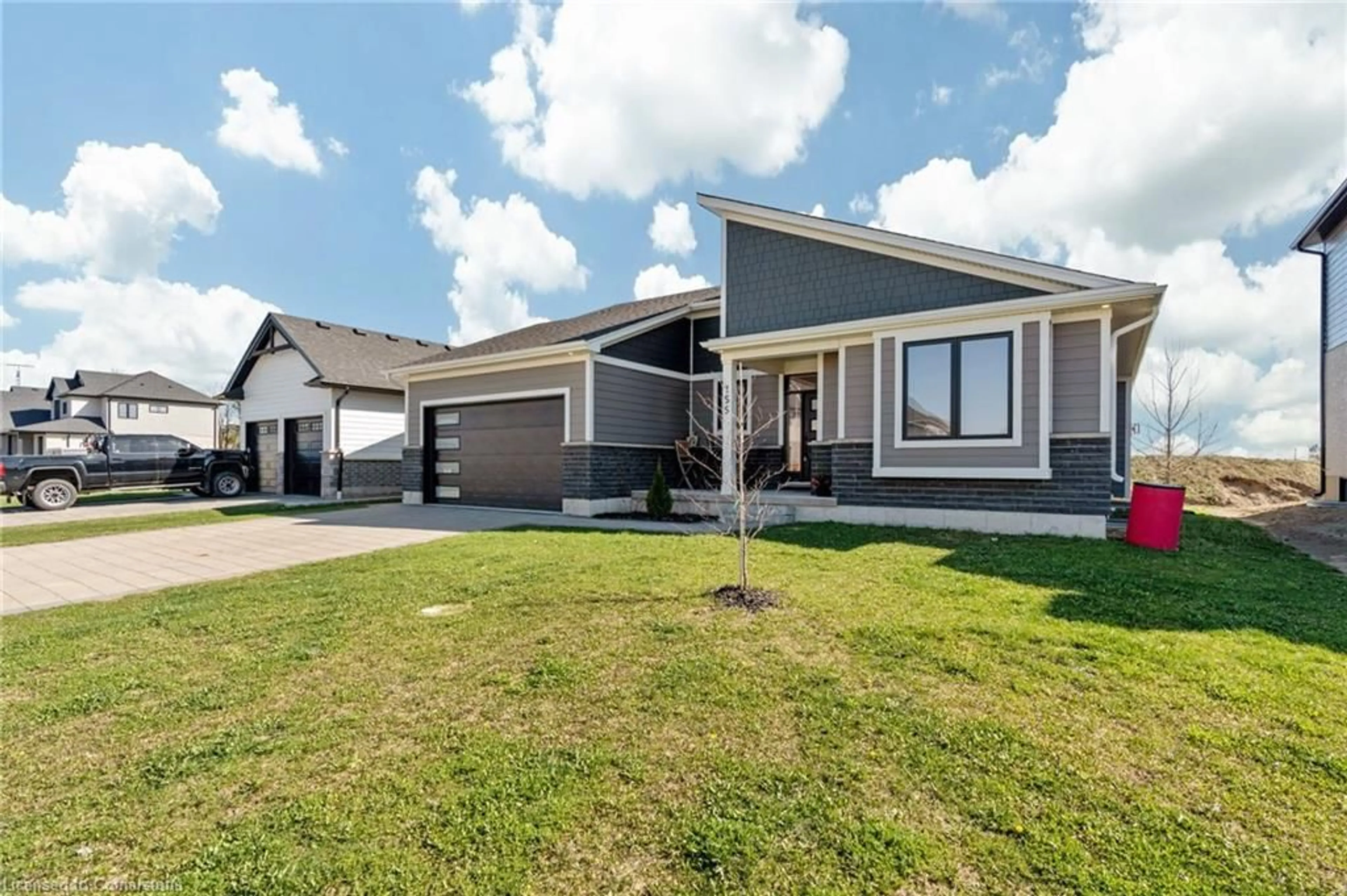 Home with vinyl exterior material, street for 155 Mcleod St, Parkhill Ontario N0M 2K0
