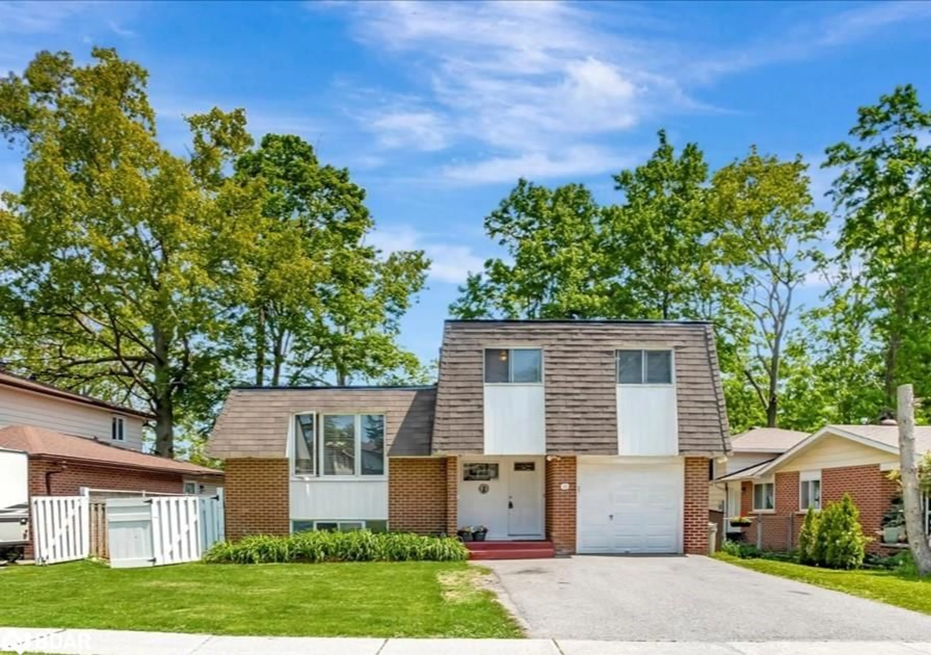 Home with brick exterior material, street for 45 Springdale Dr, Barrie Ontario L4M 5A8