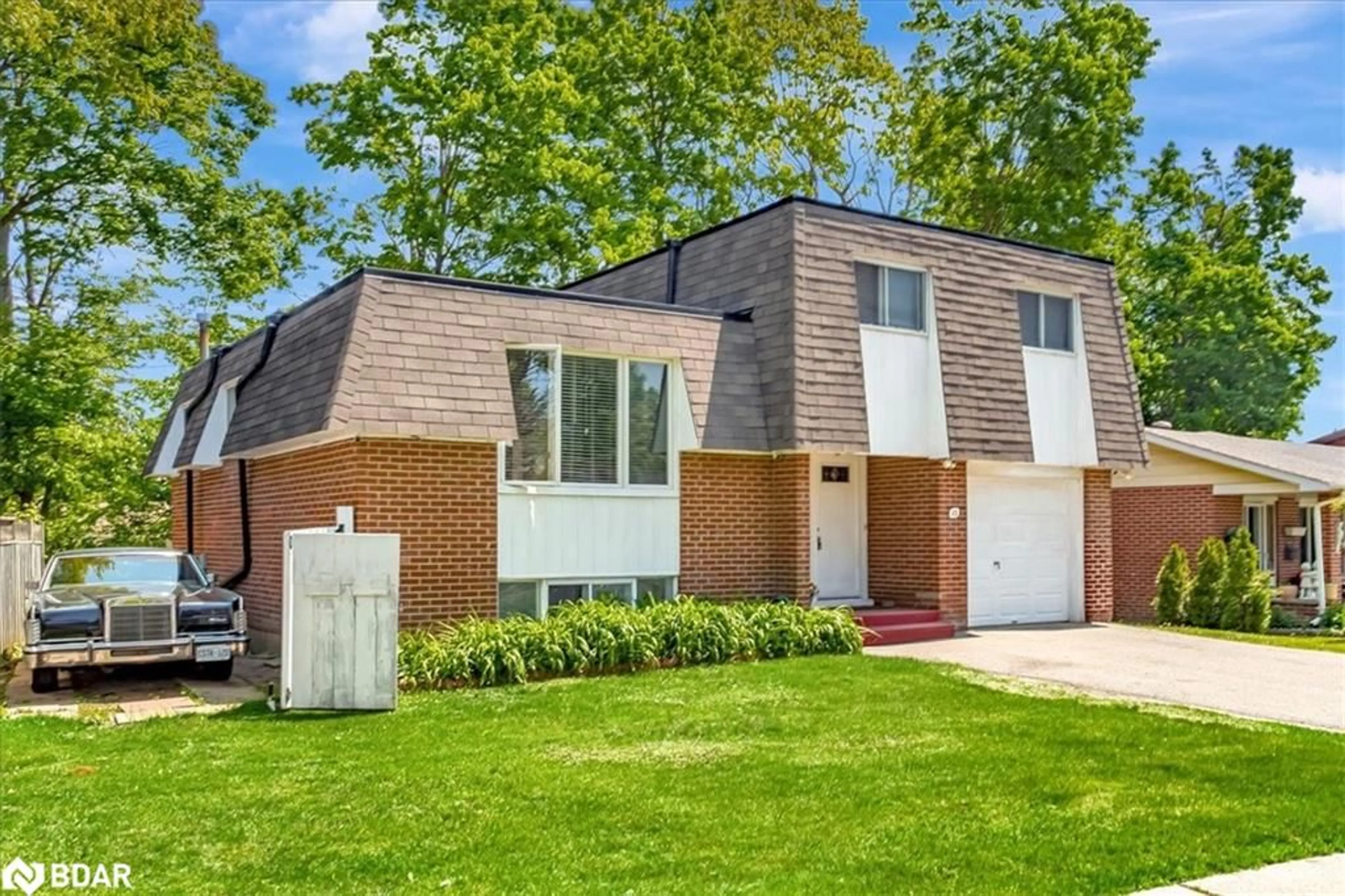 Home with brick exterior material, street for 45 Springdale Dr, Barrie Ontario L4M 5A8