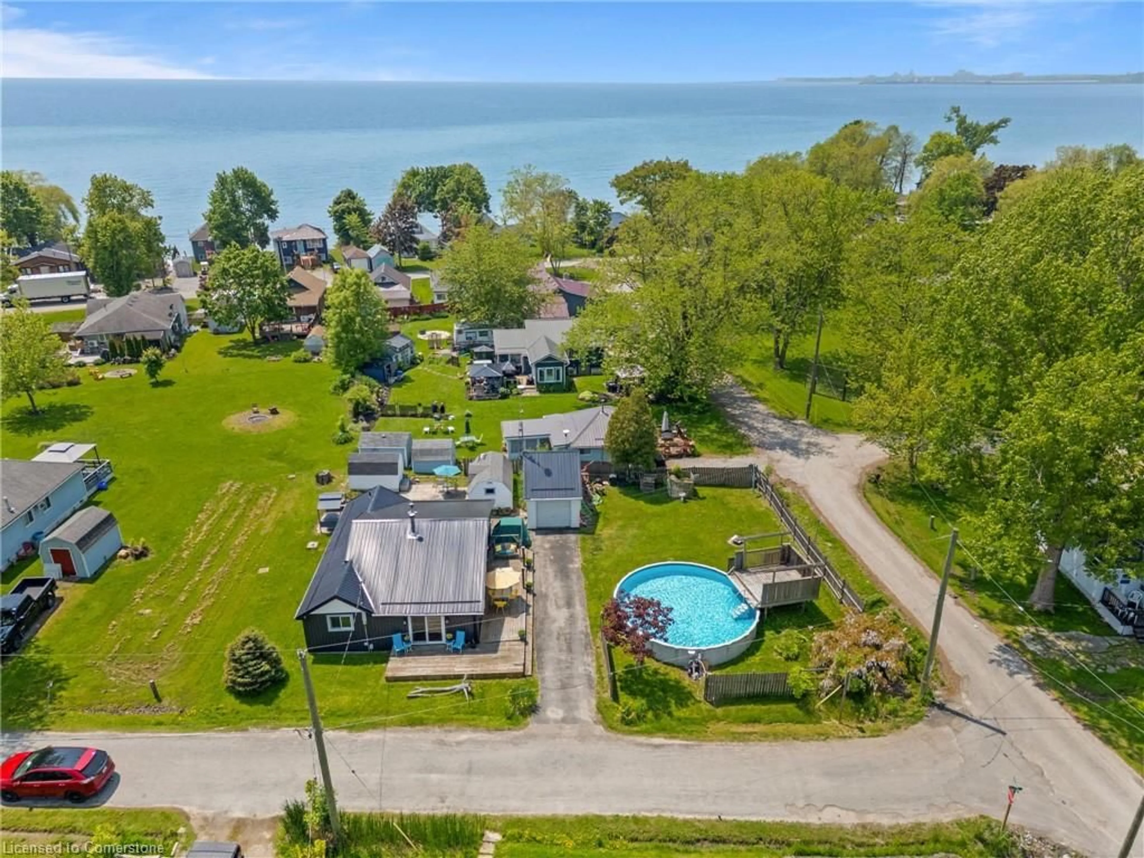 A pic from outside/outdoor area/front of a property/back of a property/a pic from drone, water/lake/river/ocean view for 2 Reidy St, Nanticoke Ontario N0A 1L0
