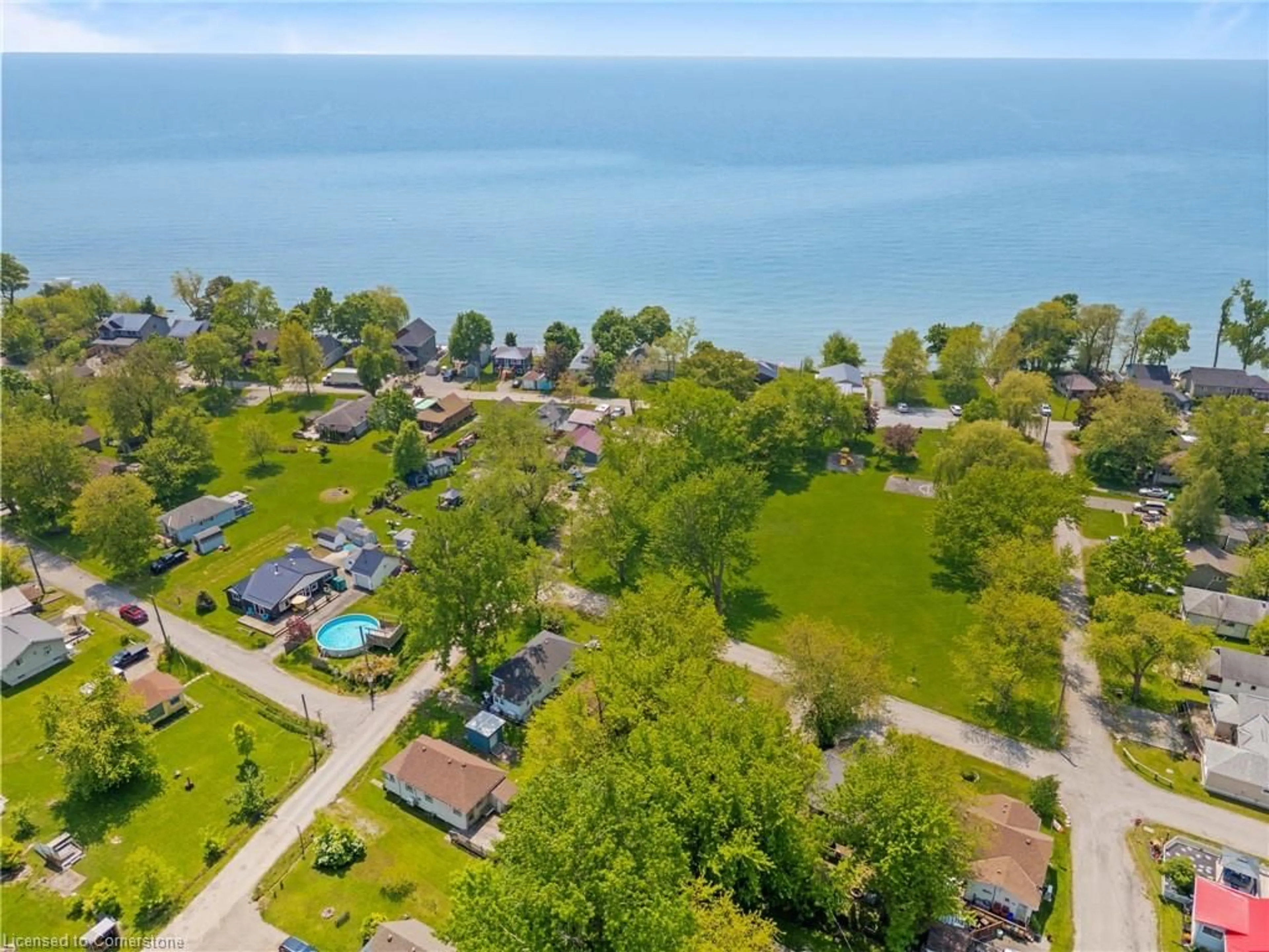 A pic from outside/outdoor area/front of a property/back of a property/a pic from drone, water/lake/river/ocean view for 2 Reidy St, Nanticoke Ontario N0A 1L0