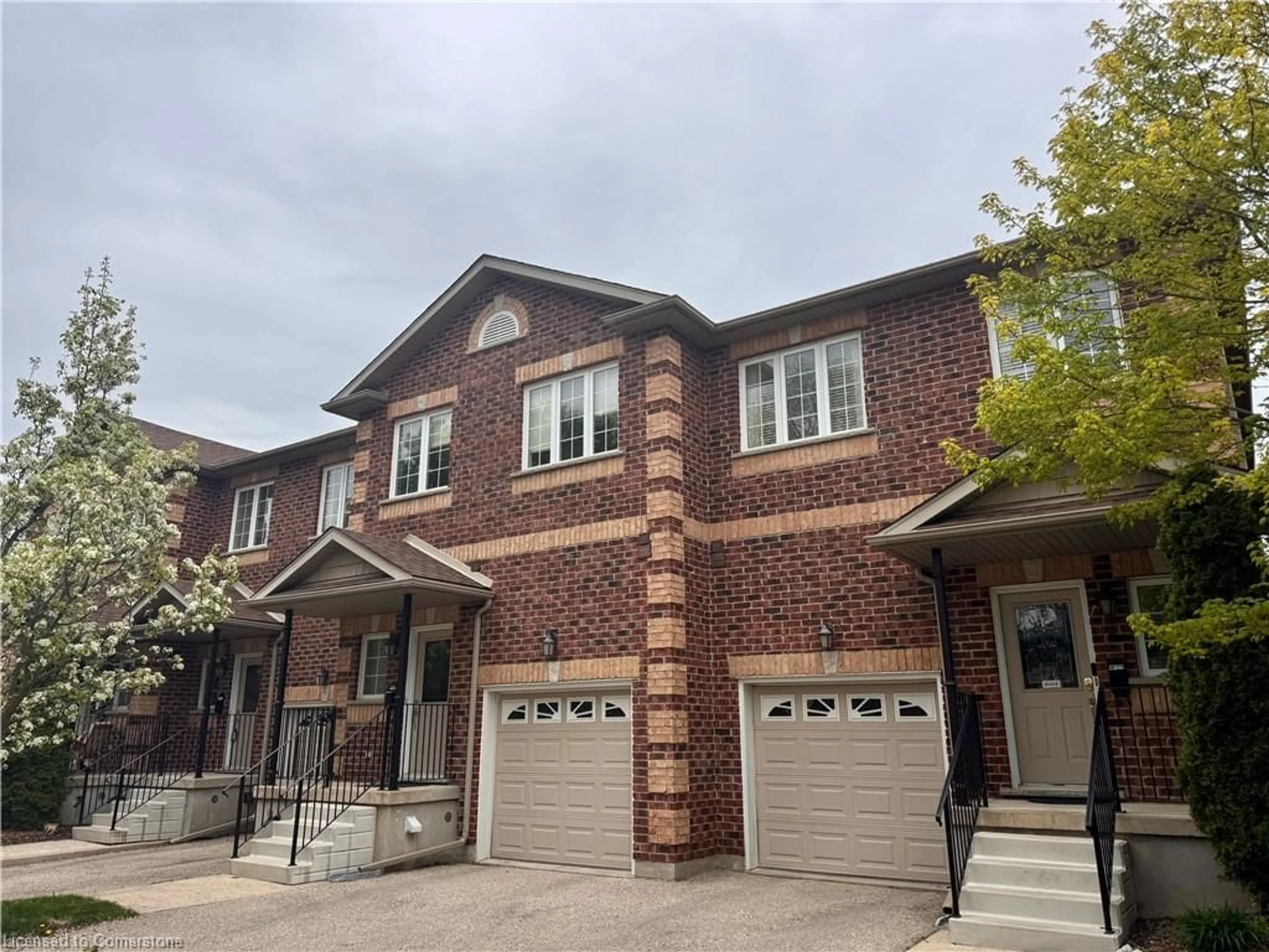 Home with brick exterior material, street for 76 Woolwich St #7, Kitchener Ontario N2K 1S3