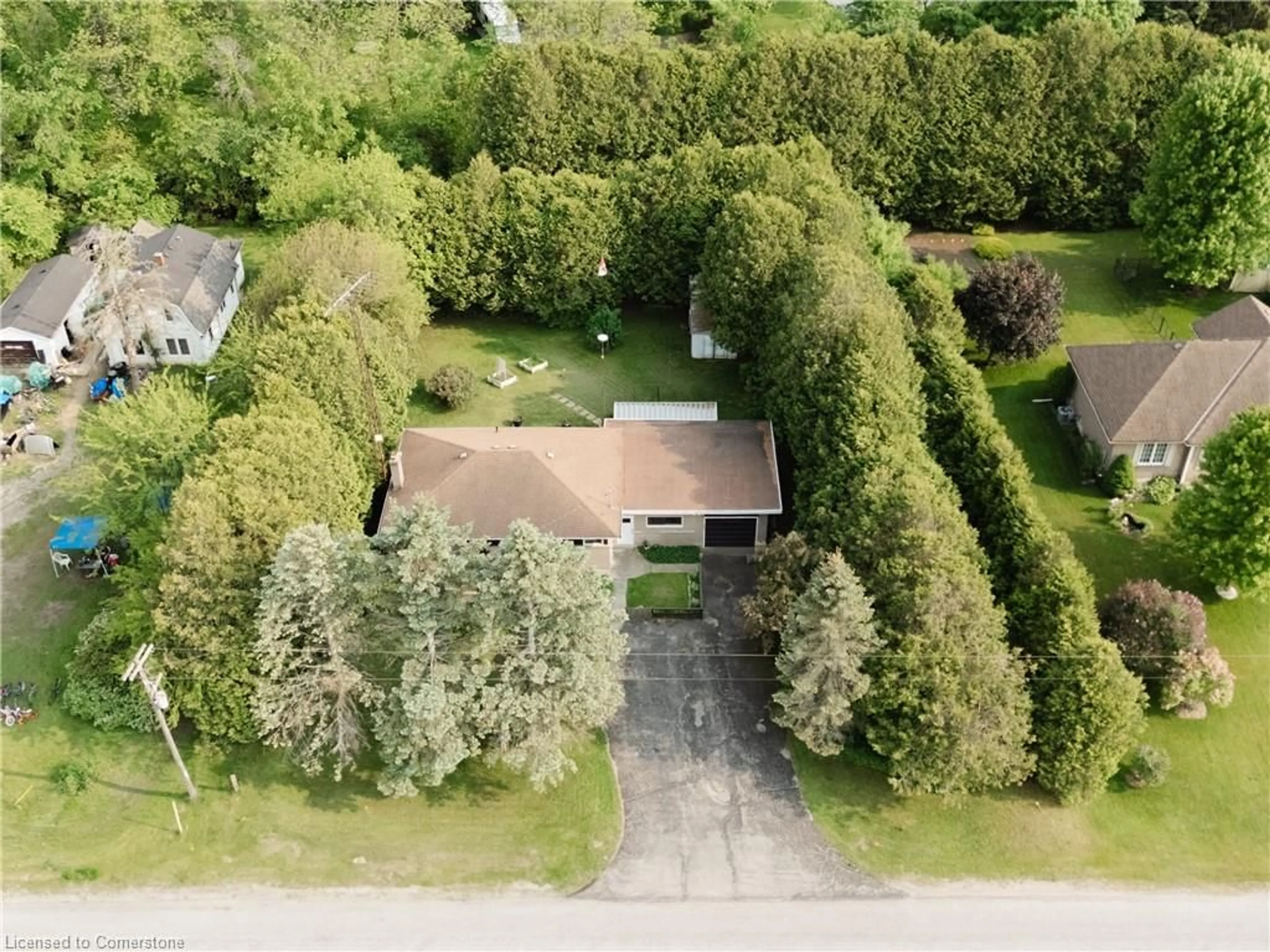 A pic from outside/outdoor area/front of a property/back of a property/a pic from drone, street for 252 Windham Road 13, Delhi Ontario N4B 2W5