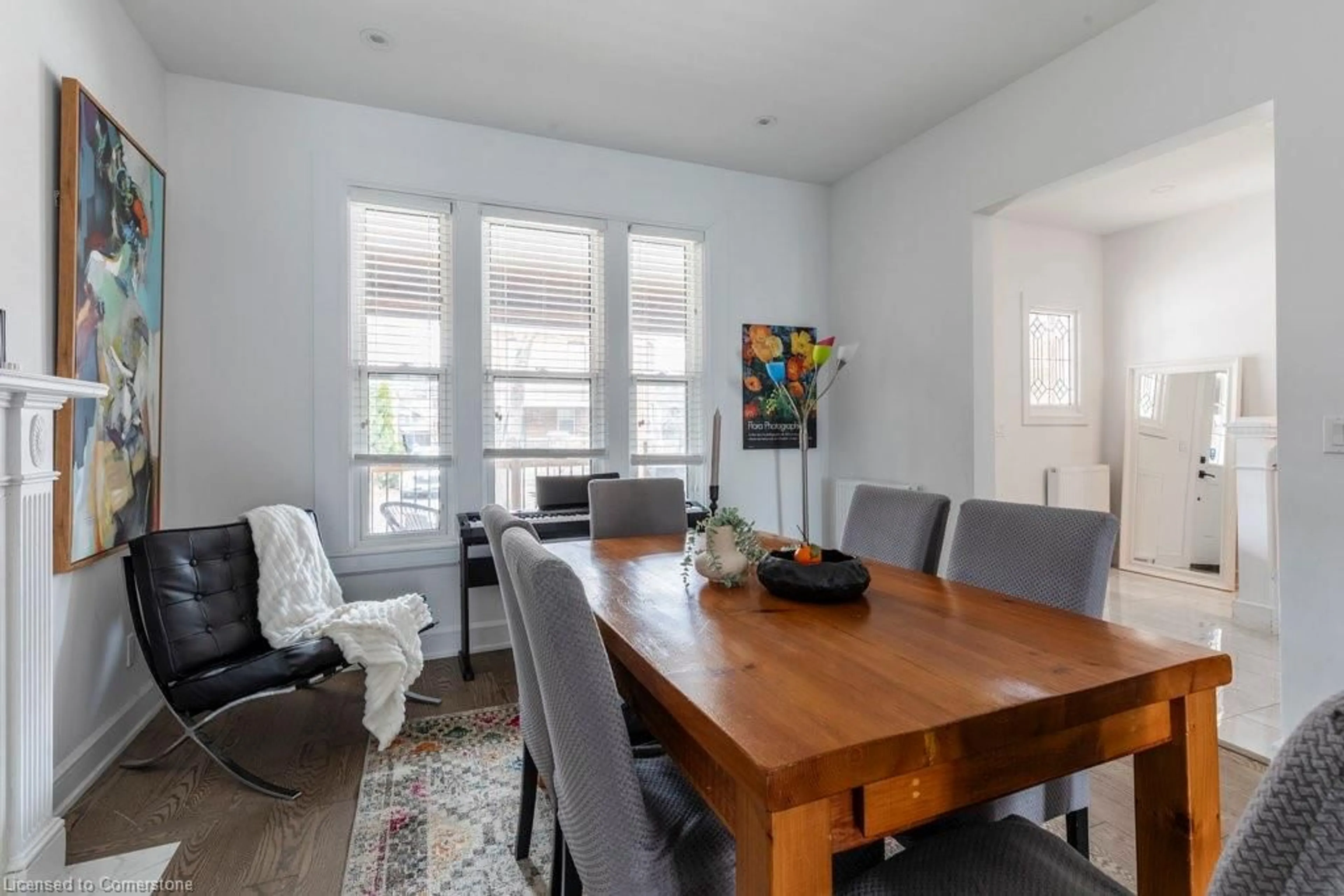 Dining room, wood/laminate floor for 79 Fairholt Rd, Hamilton Ontario L8M 2T6