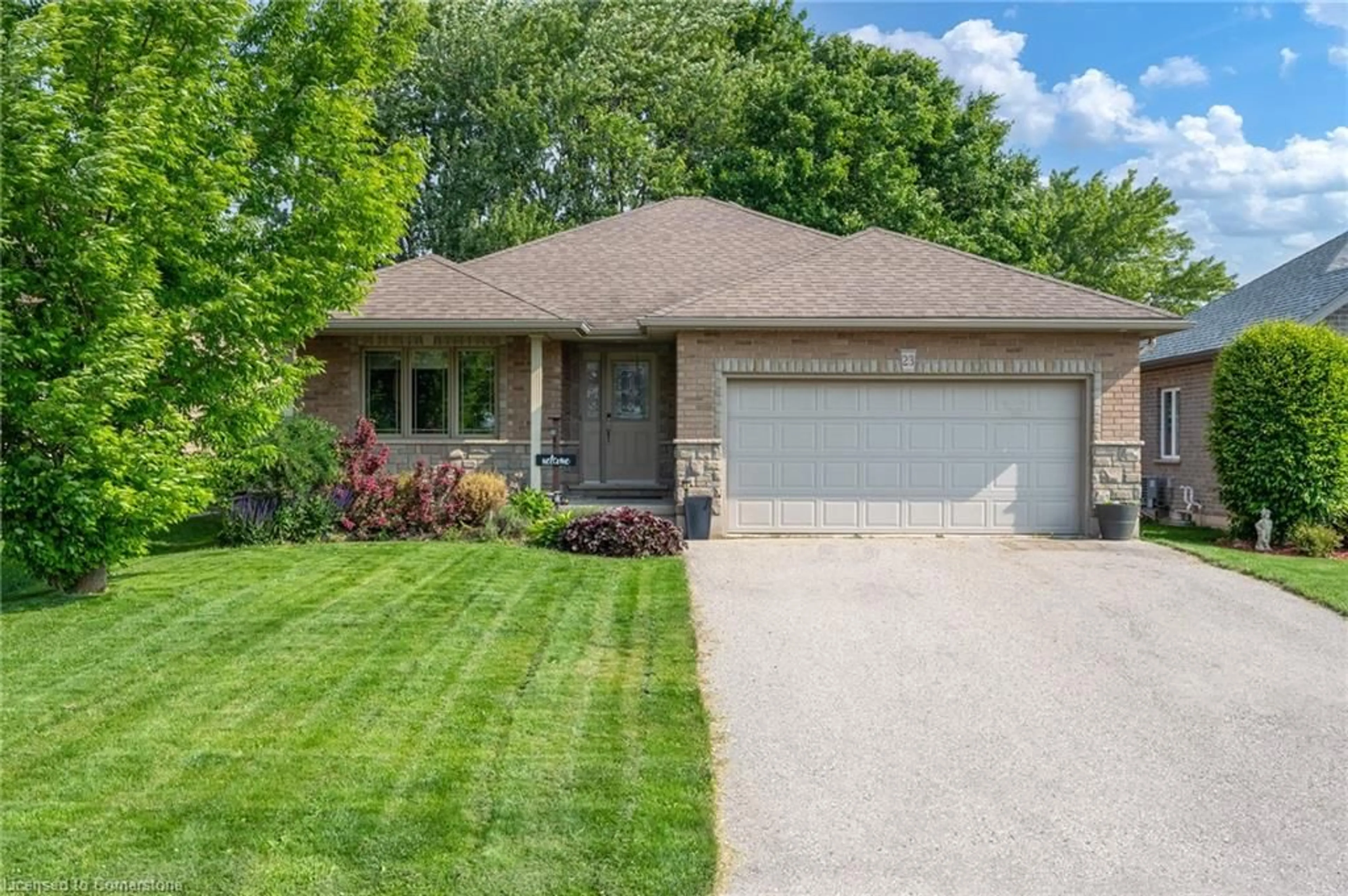 Home with brick exterior material, street for 23 Irving Dr, Norwich Ontario N0J 1P0