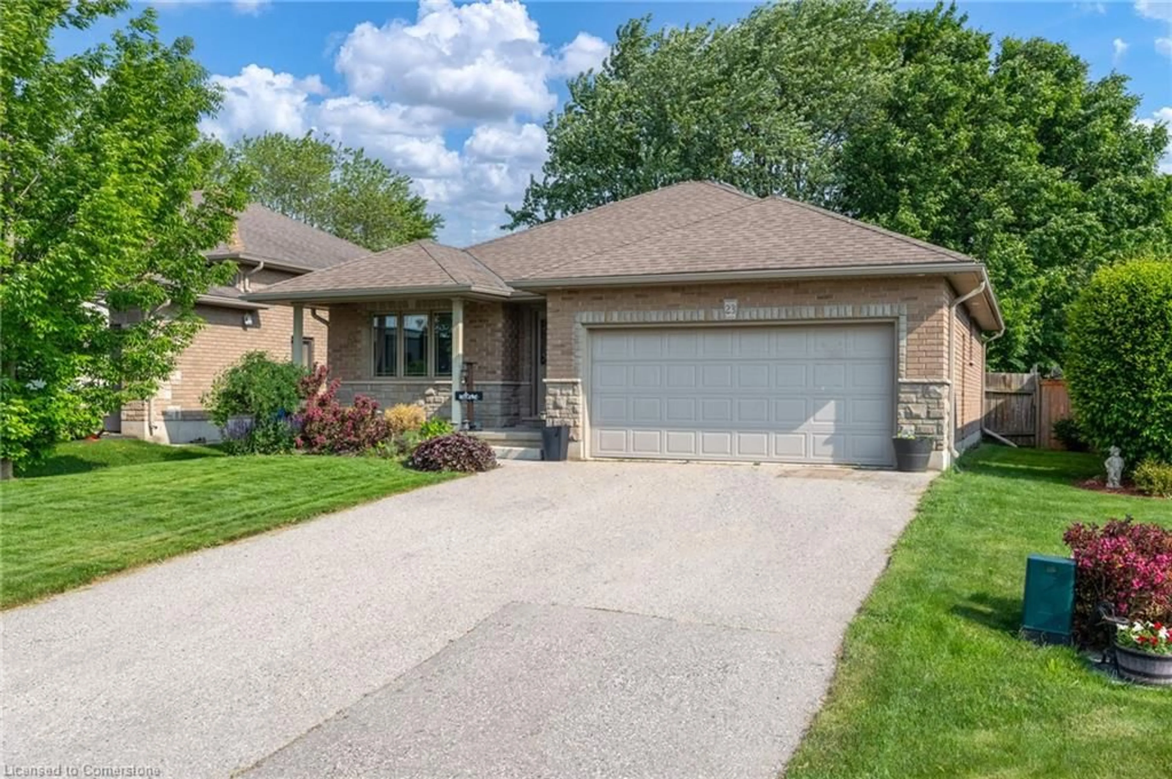 Home with brick exterior material, street for 23 Irving Dr, Norwich Ontario N0J 1P0