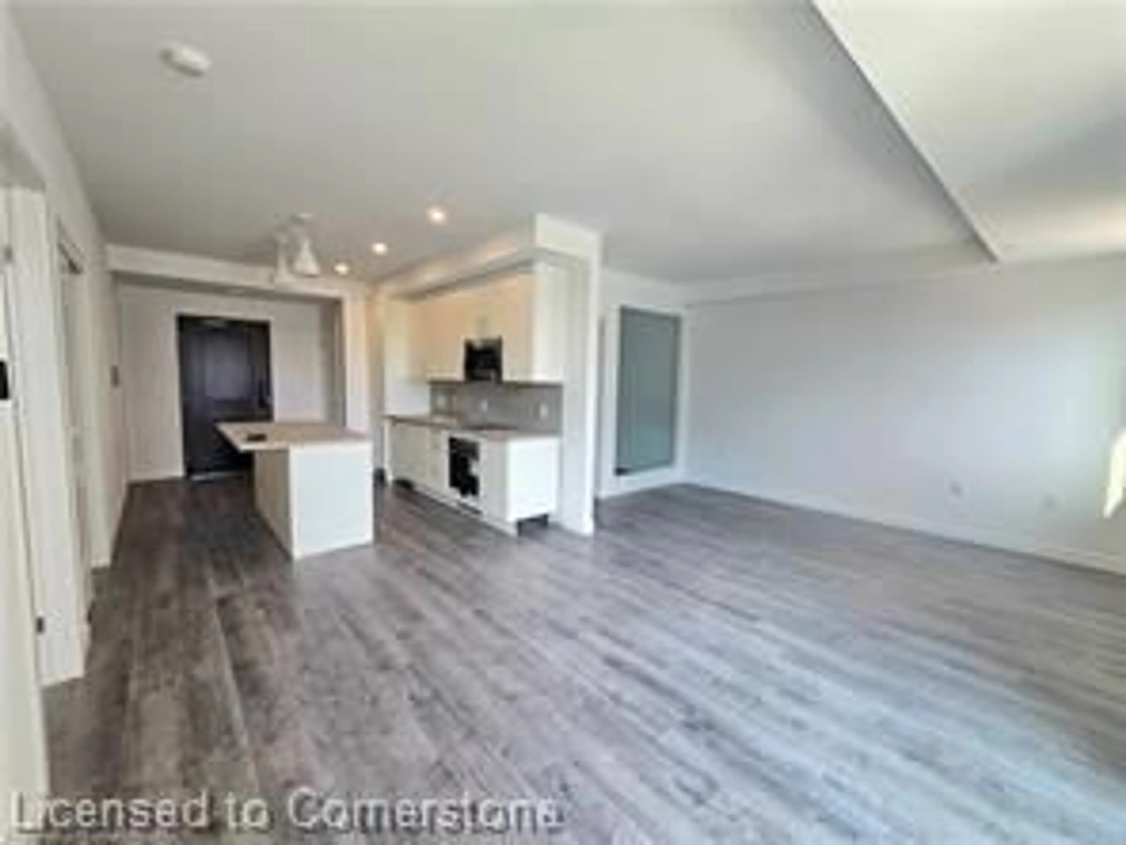 Open concept kitchen, wood/laminate floor for 7549A Kalar Road Rd #214, Niagara Falls Ontario L2H 2Y6