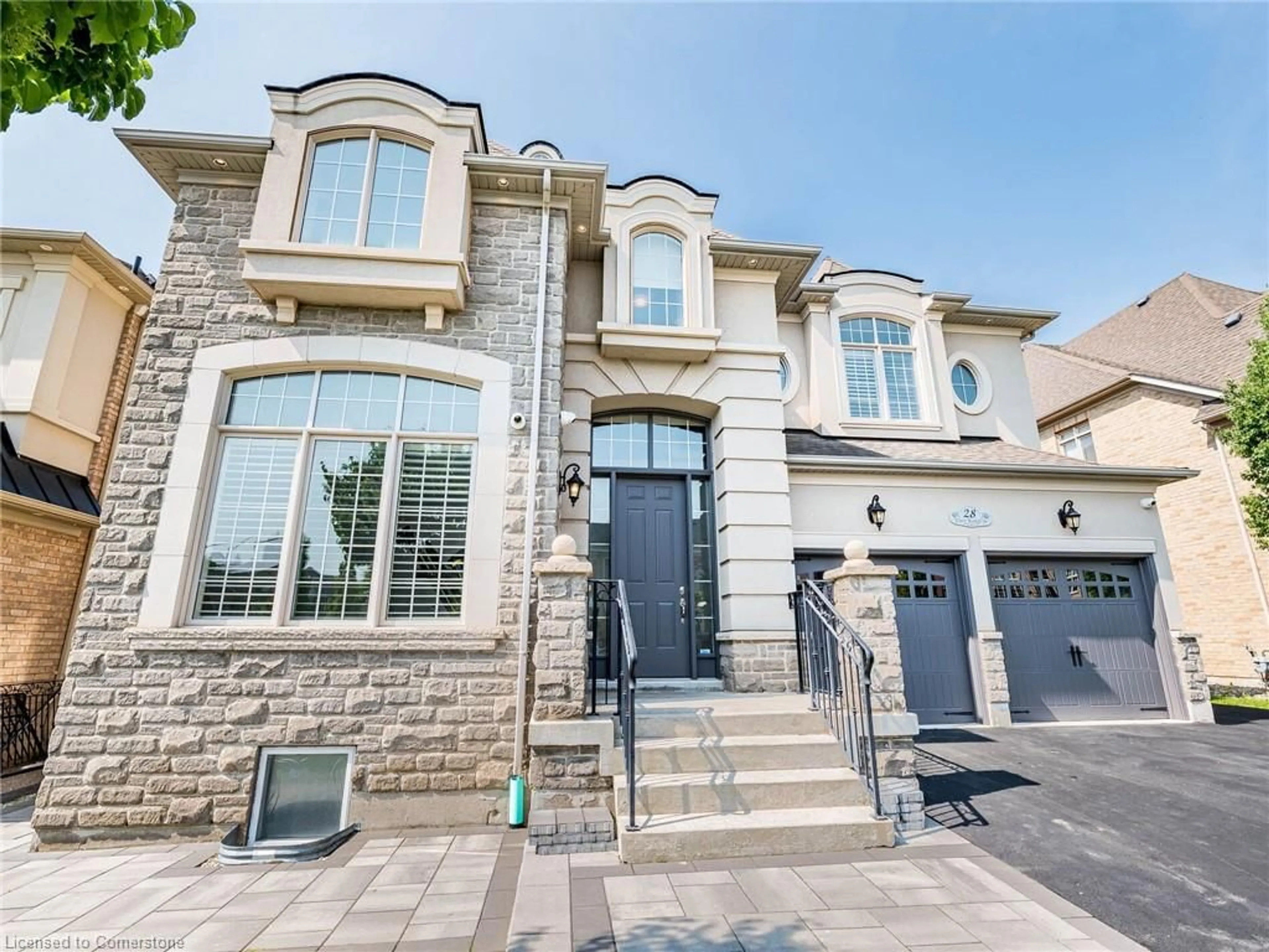 Home with brick exterior material, street for 28 Elbern Markell Run, Brampton Ontario L6X 2X5