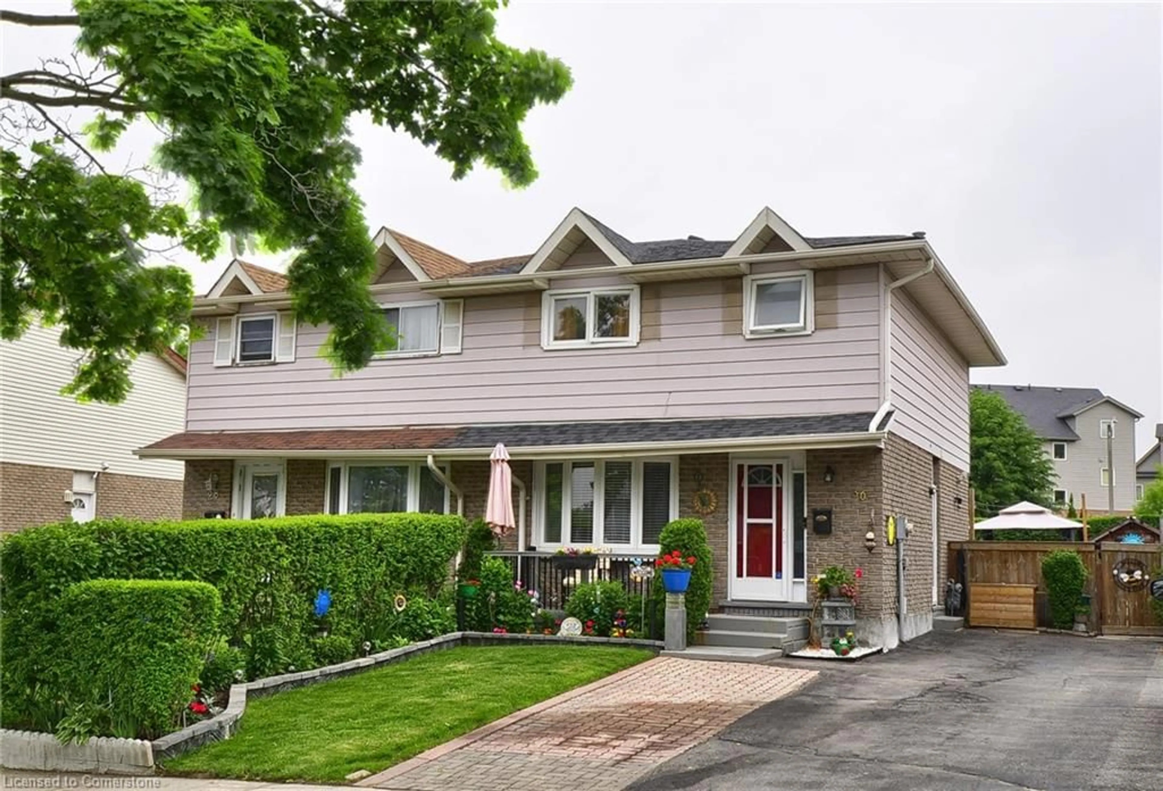 Home with vinyl exterior material, street for 30 The Country Way, Kitchener Ontario N2E 2K8