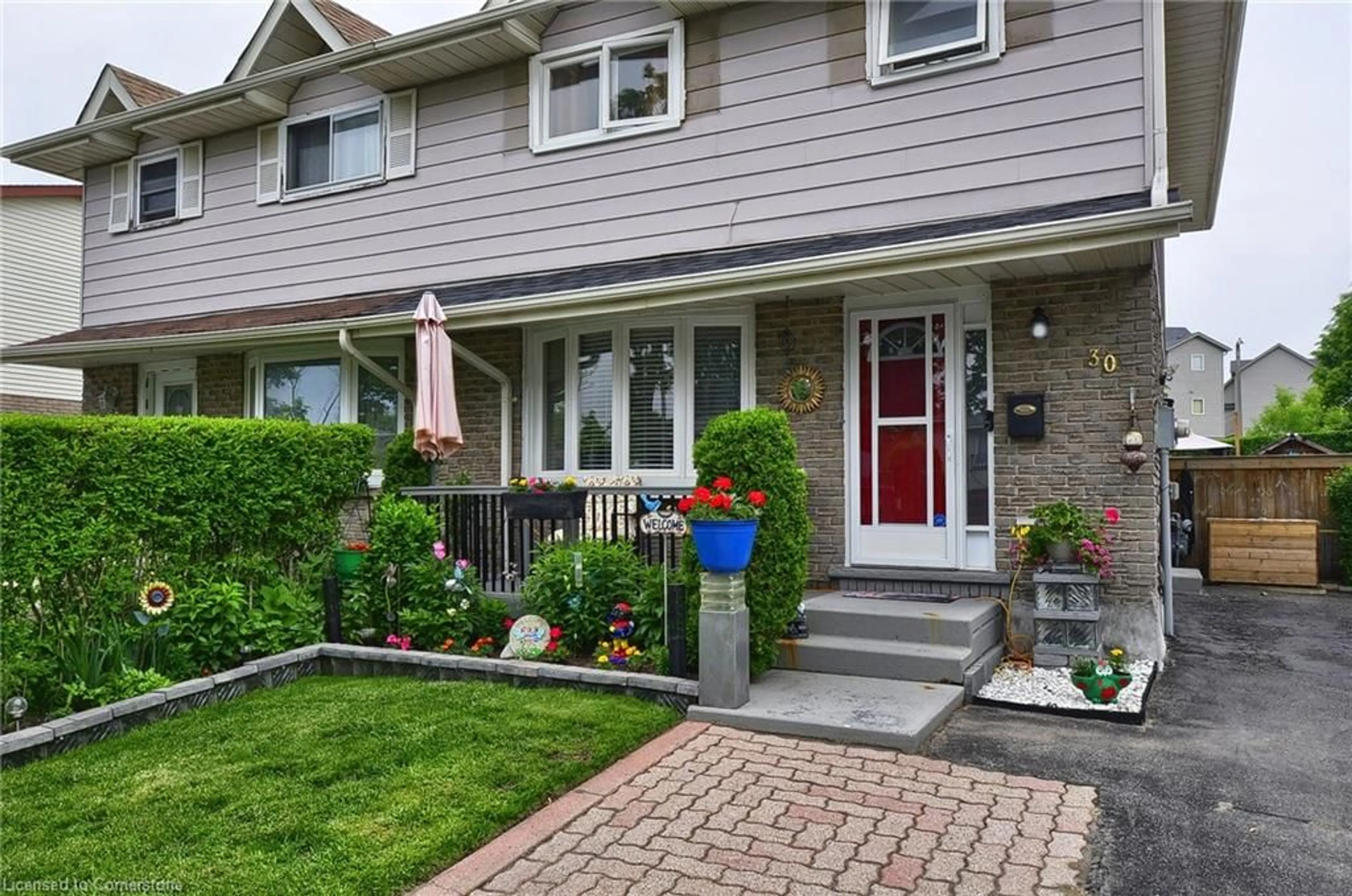 Home with brick exterior material, street for 30 The Country Way, Kitchener Ontario N2E 2K8